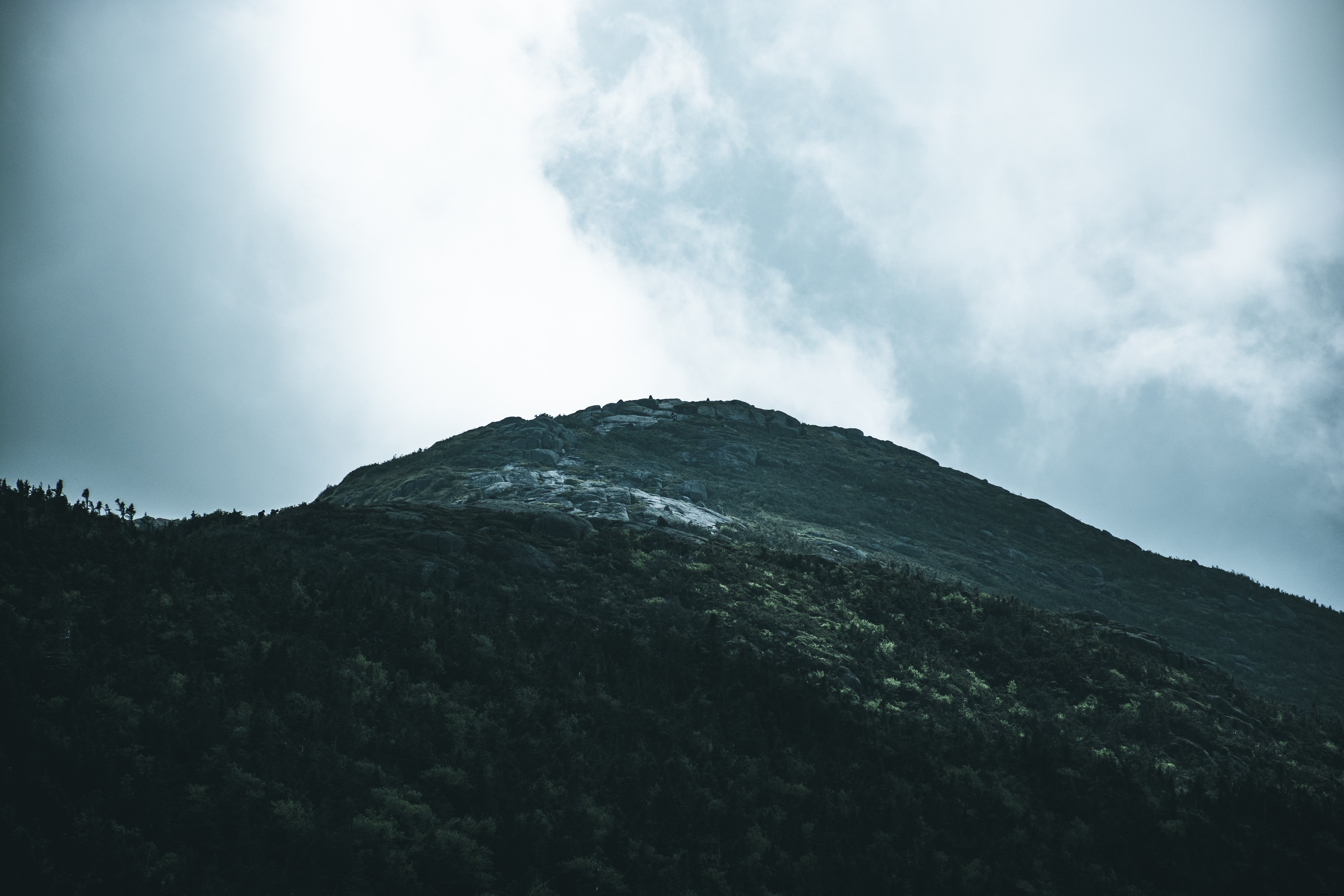 Stony Hill Under a Moody Grey Sky: Captivating Landscape Photo