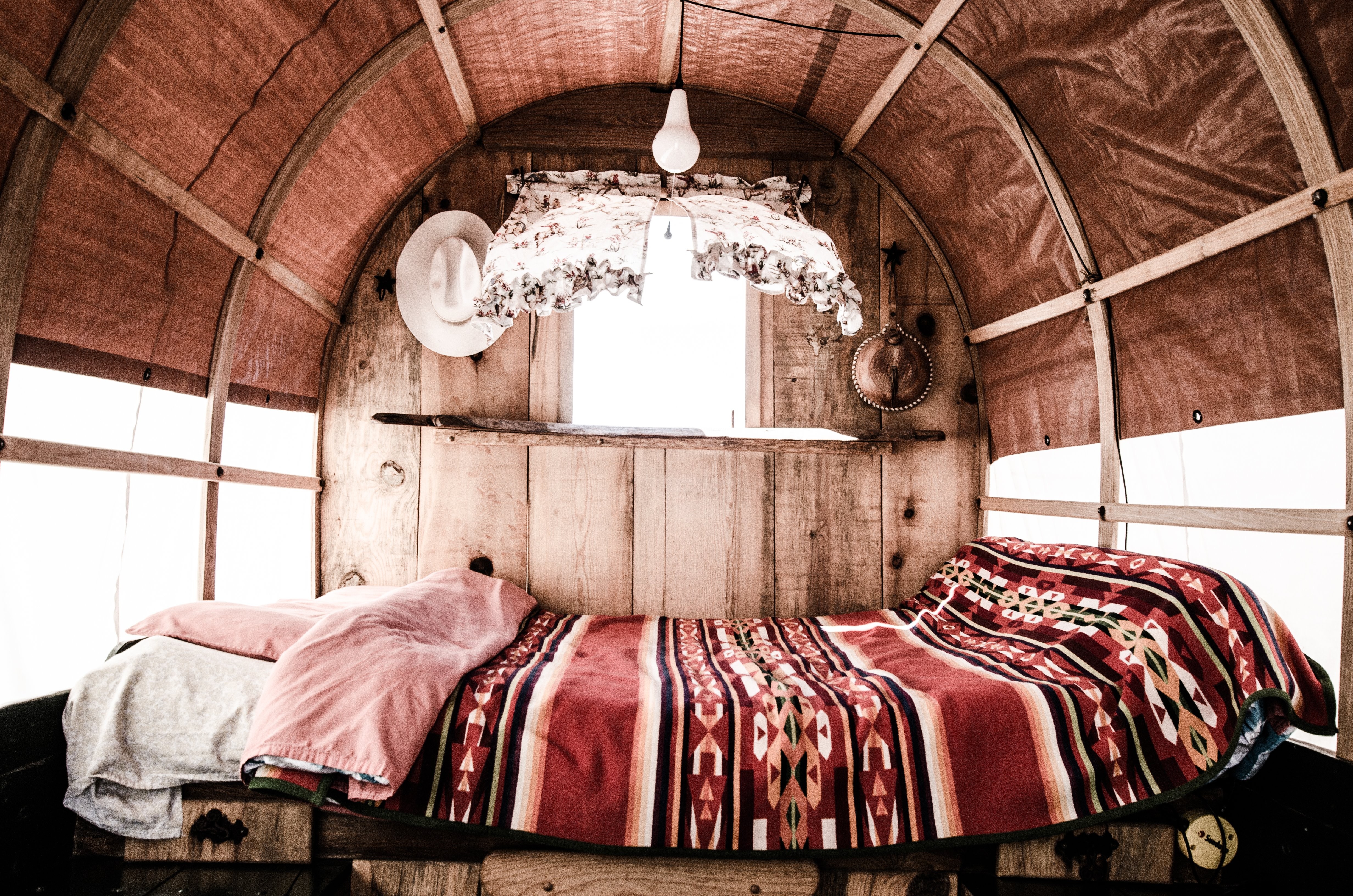 Cozy Bed with Blanket in Caravan Interior – Stunning High-Res Photo