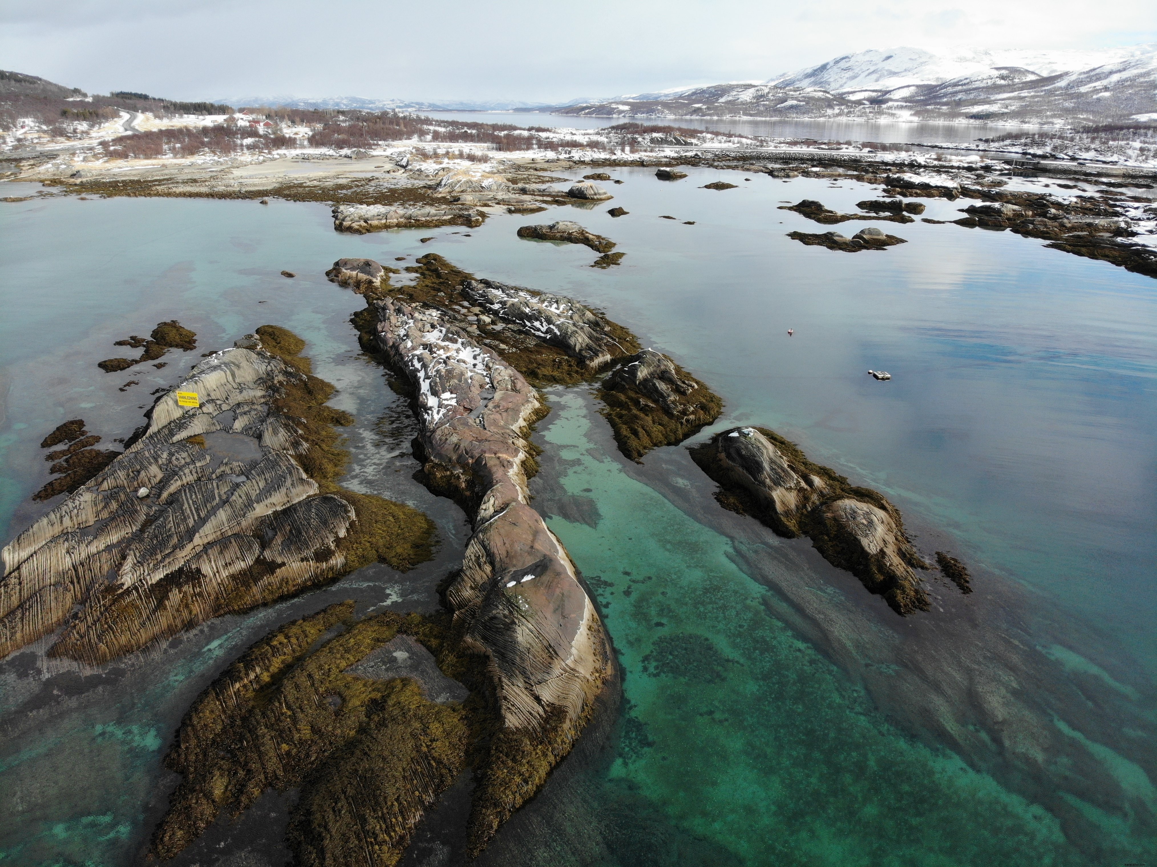 Stunning Frozen Winter Landscape Beyond a Serene Calm Lake