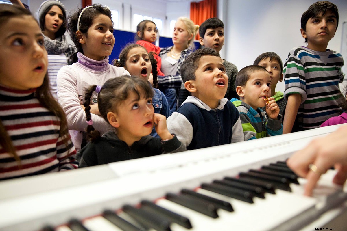 Music Brings Hope and Healing to Syrian Refugees at Berlin Camp: The Hutto Project