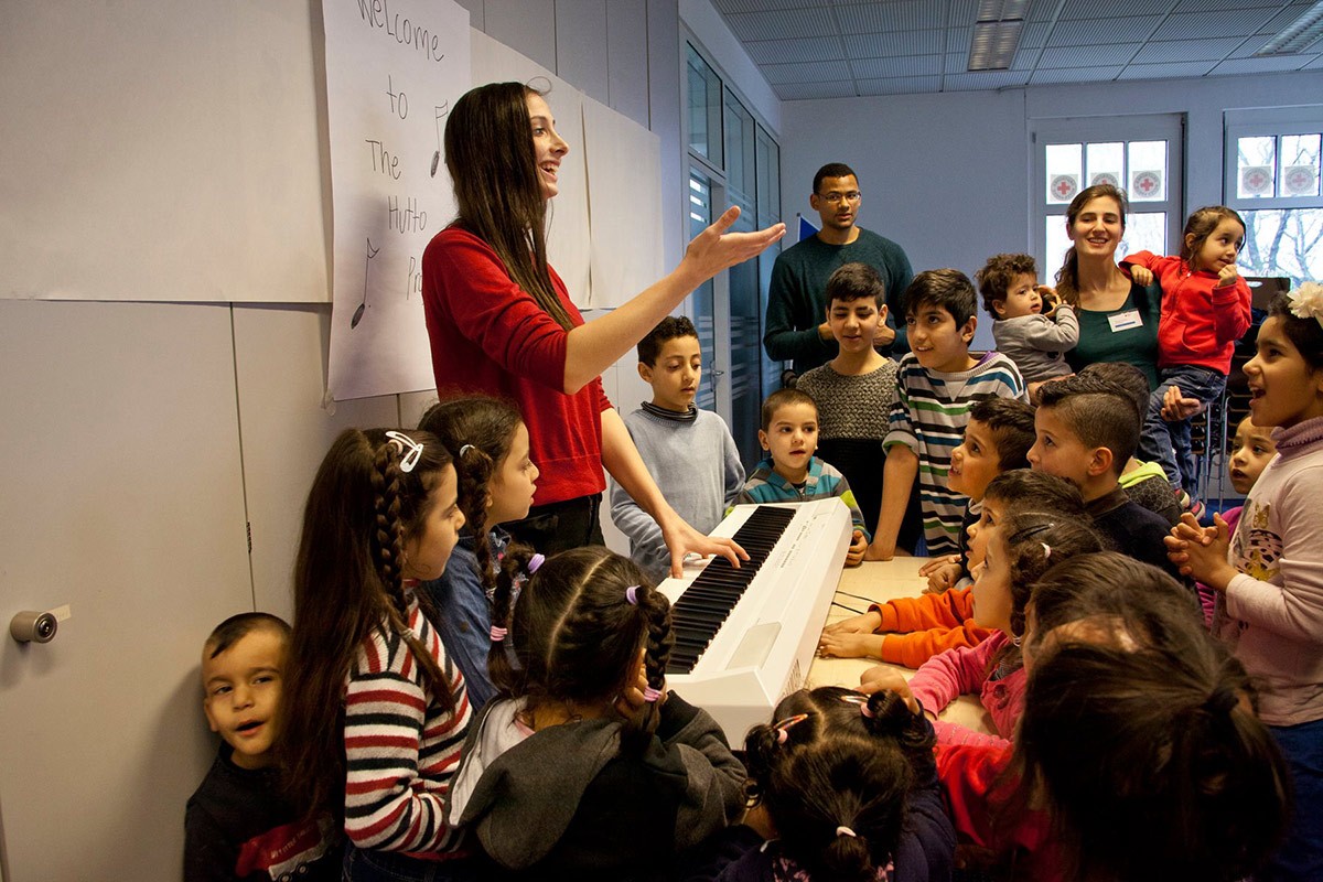 Music Brings Hope and Healing to Syrian Refugees at Berlin Camp: The Hutto Project