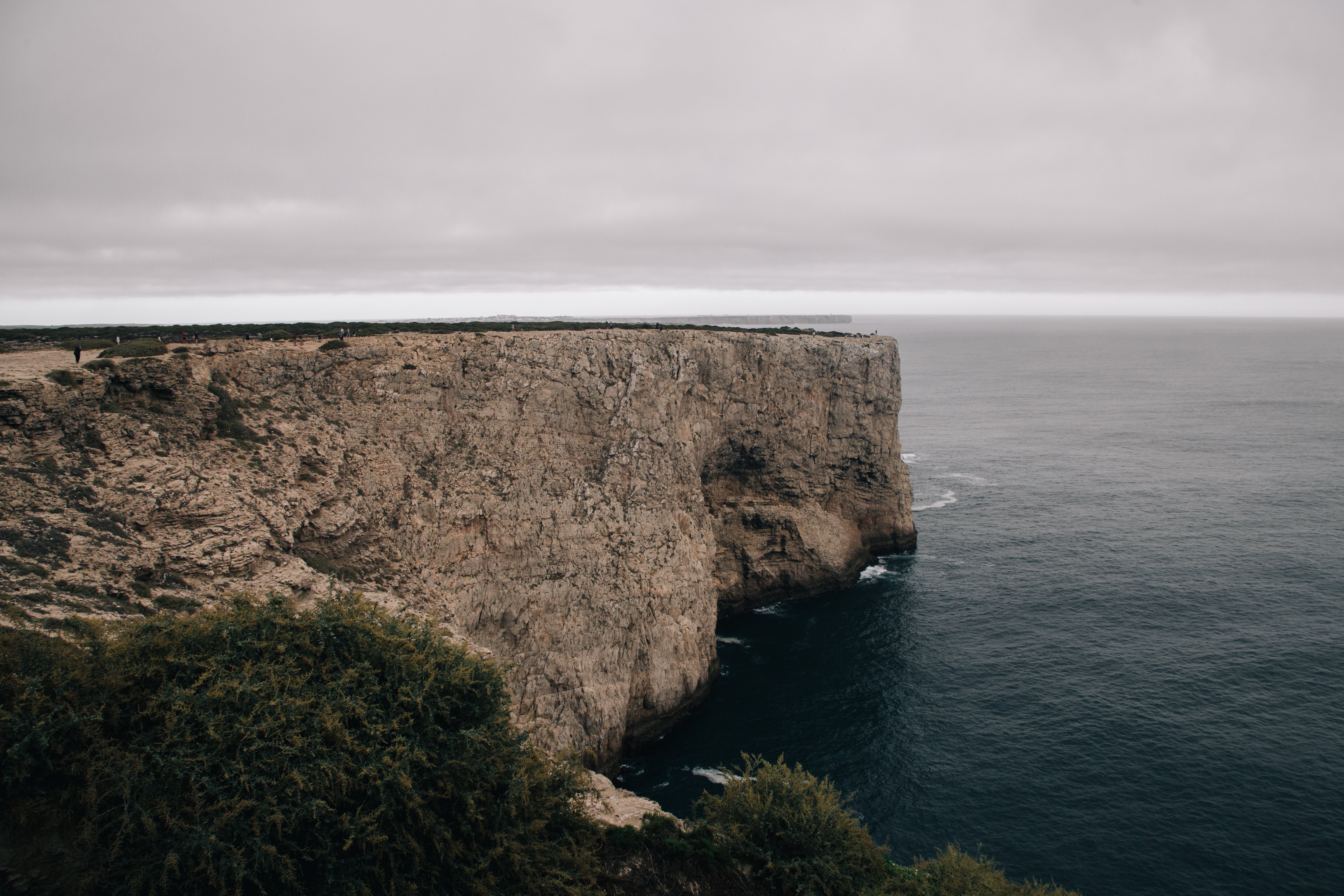 Breathtaking Photo: Long Rock Plateau Extending into the Cold Grey Sea