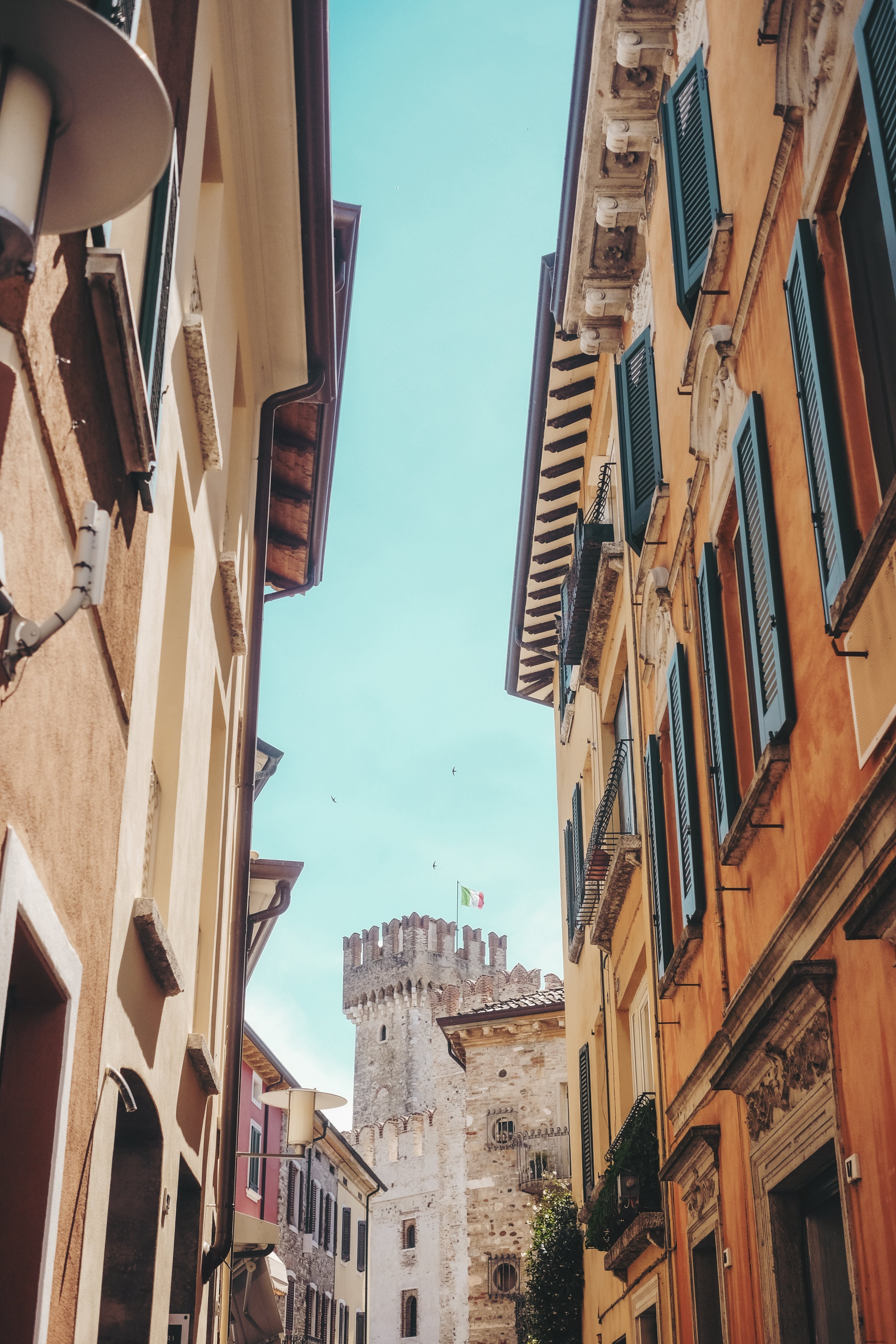 Stunning Blue Skies Over Vibrant Colorful Buildings and Majestic Castle Photo