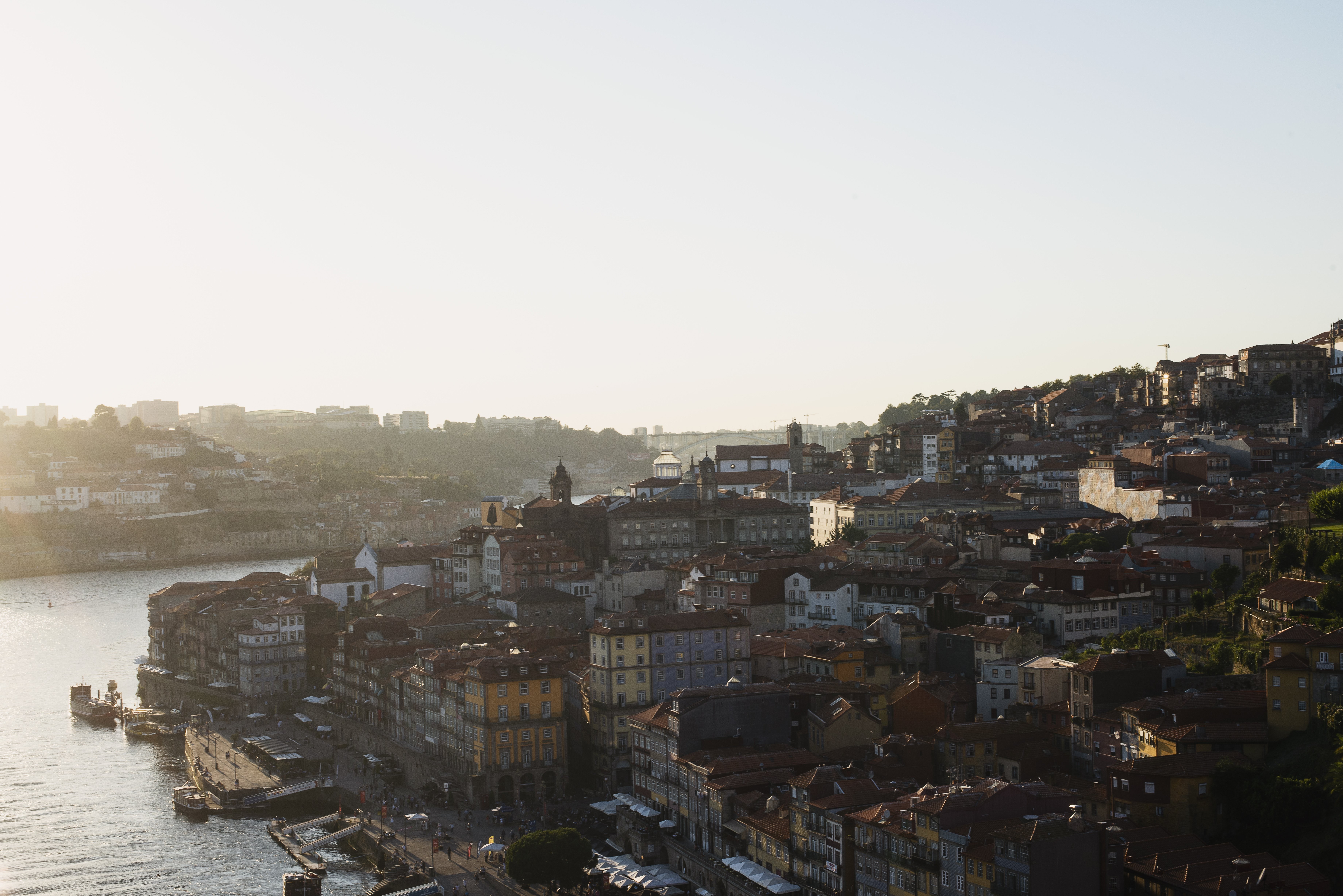 Dramatic Sunset Casting Long Shadows Over Rooftops – Stunning Photo
