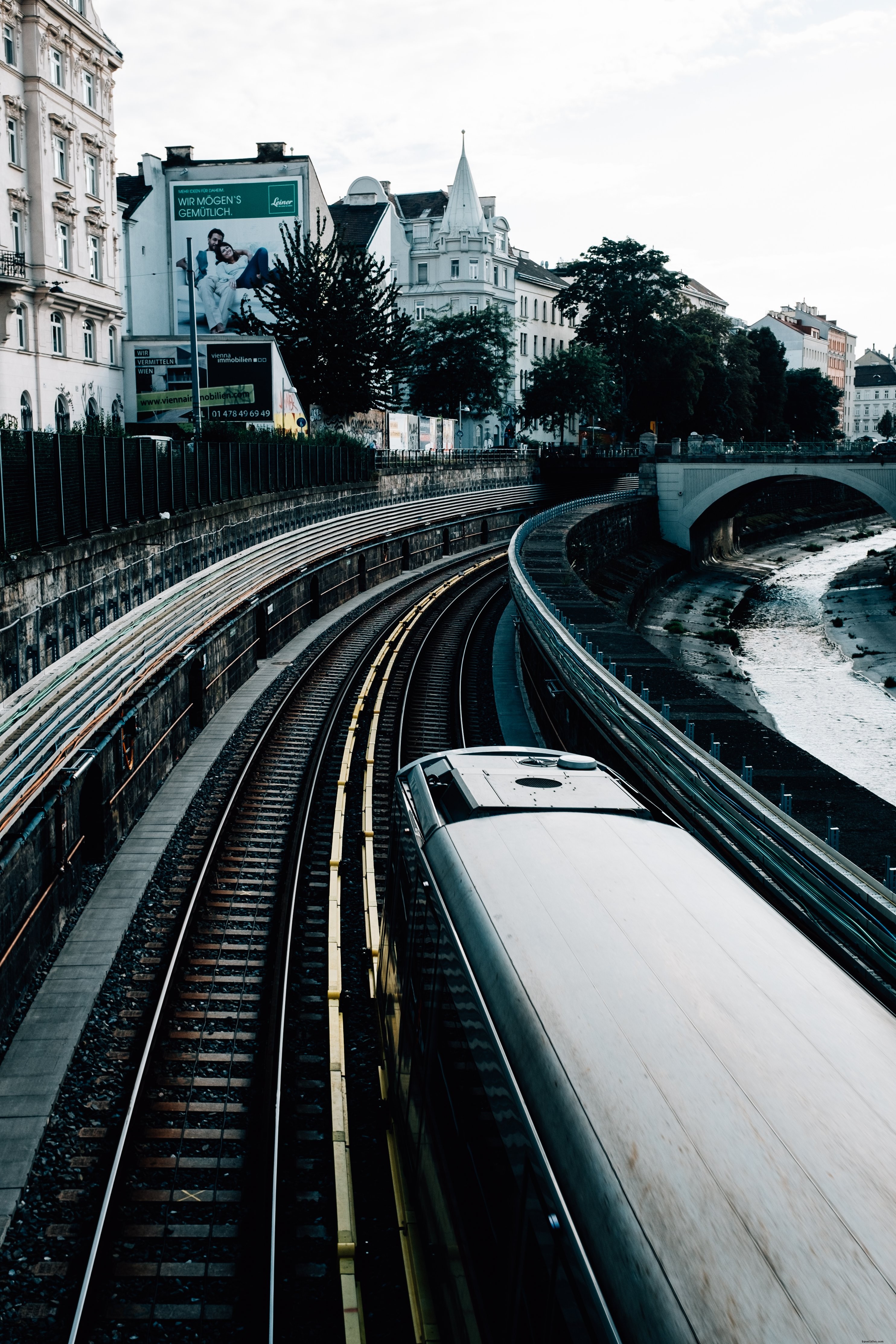 Stunning Photo: Train Departing from Riverside Station