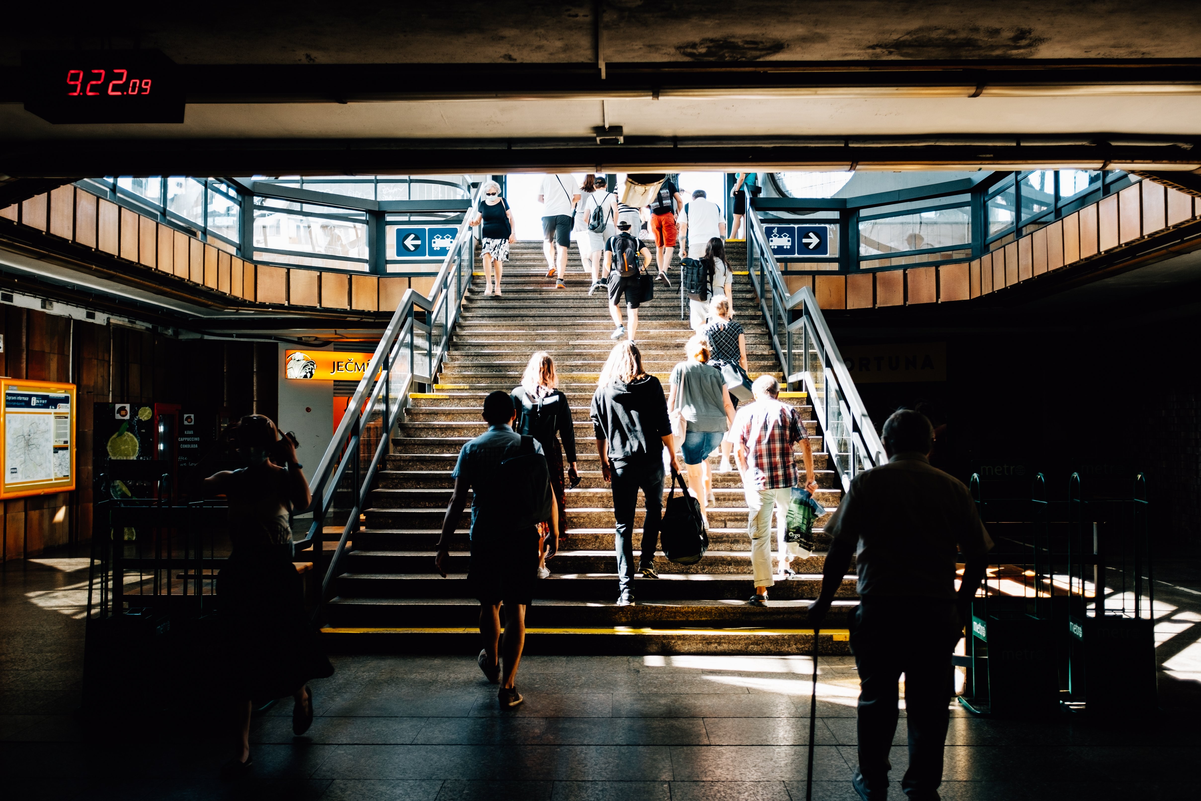 Stunning Illuminated Staircase in Bustling Train Station Photo