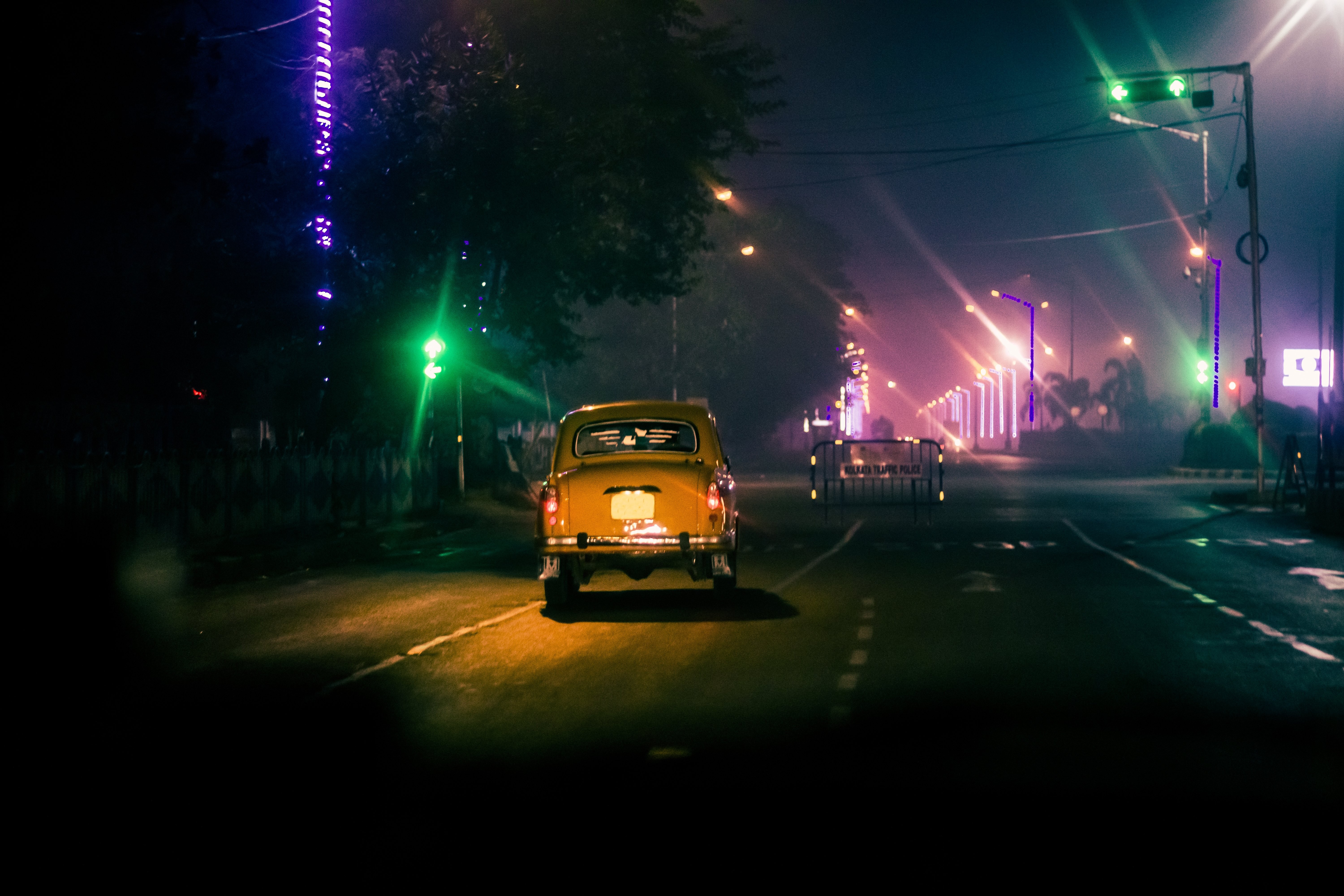 Stunning Night Photo: Taxi Cab on Empty Urban Street