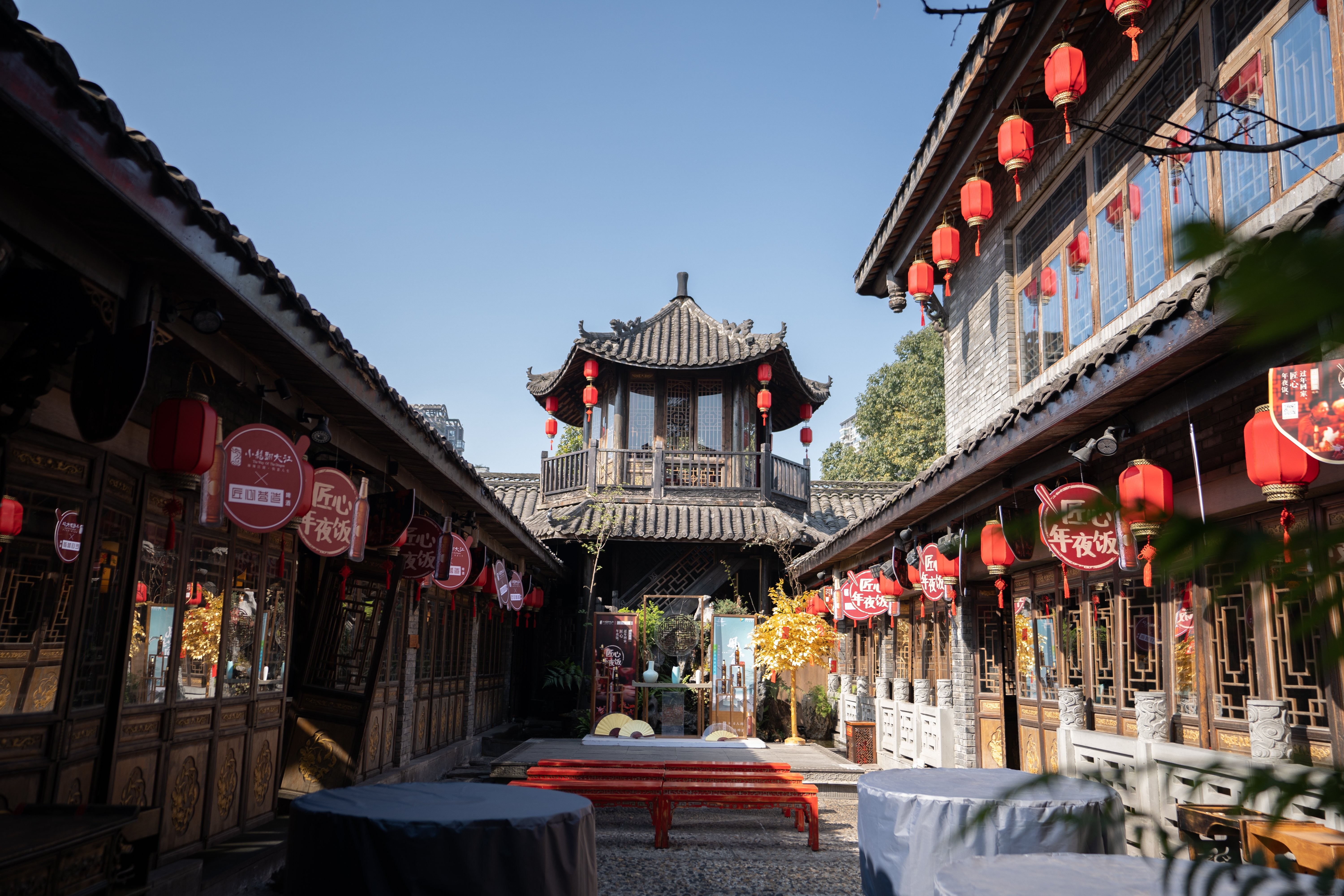 Stunning Open Courtyard Adorned with Vibrant Red Lanterns at Every Doorway