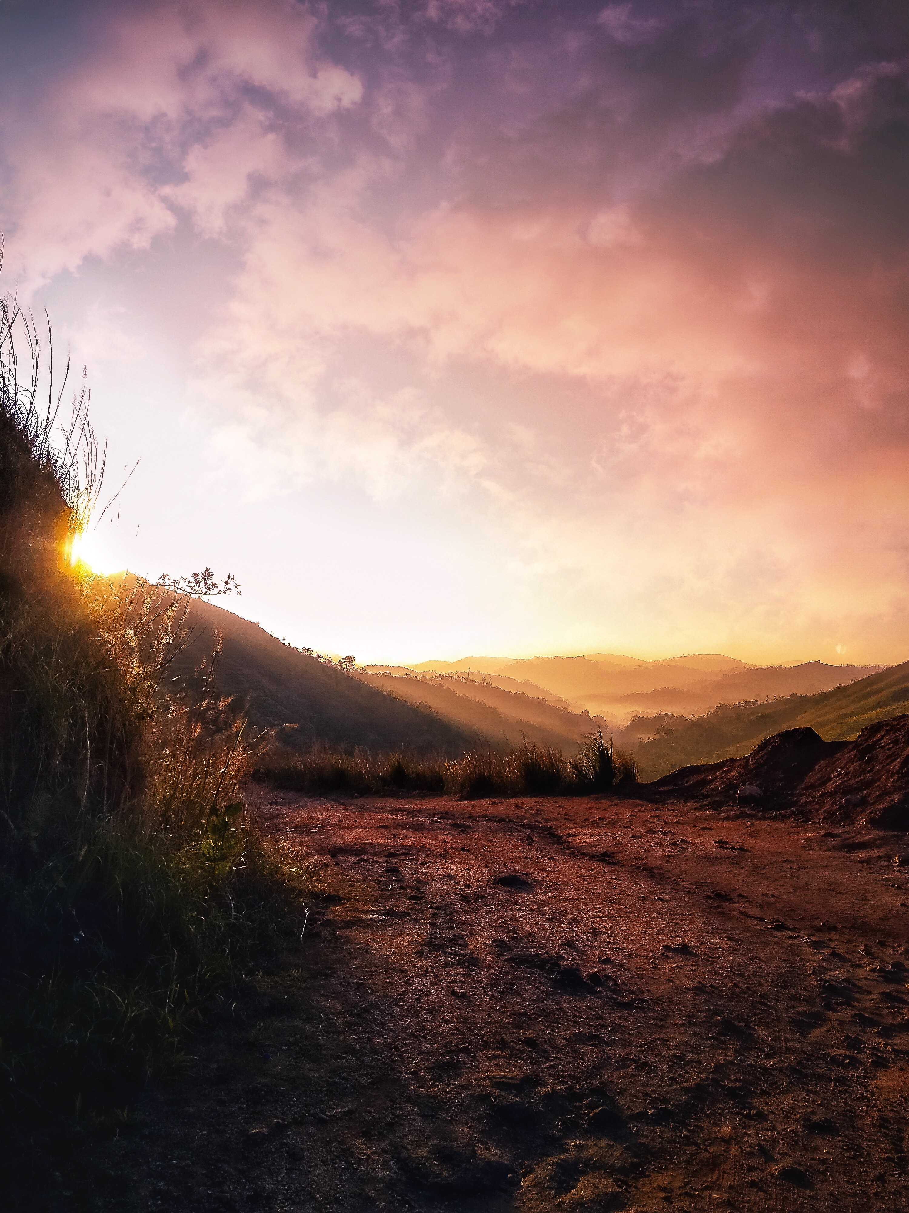 Sunlit Hills Bursting with Vibrant Colors: Stunning Landscape Photo
