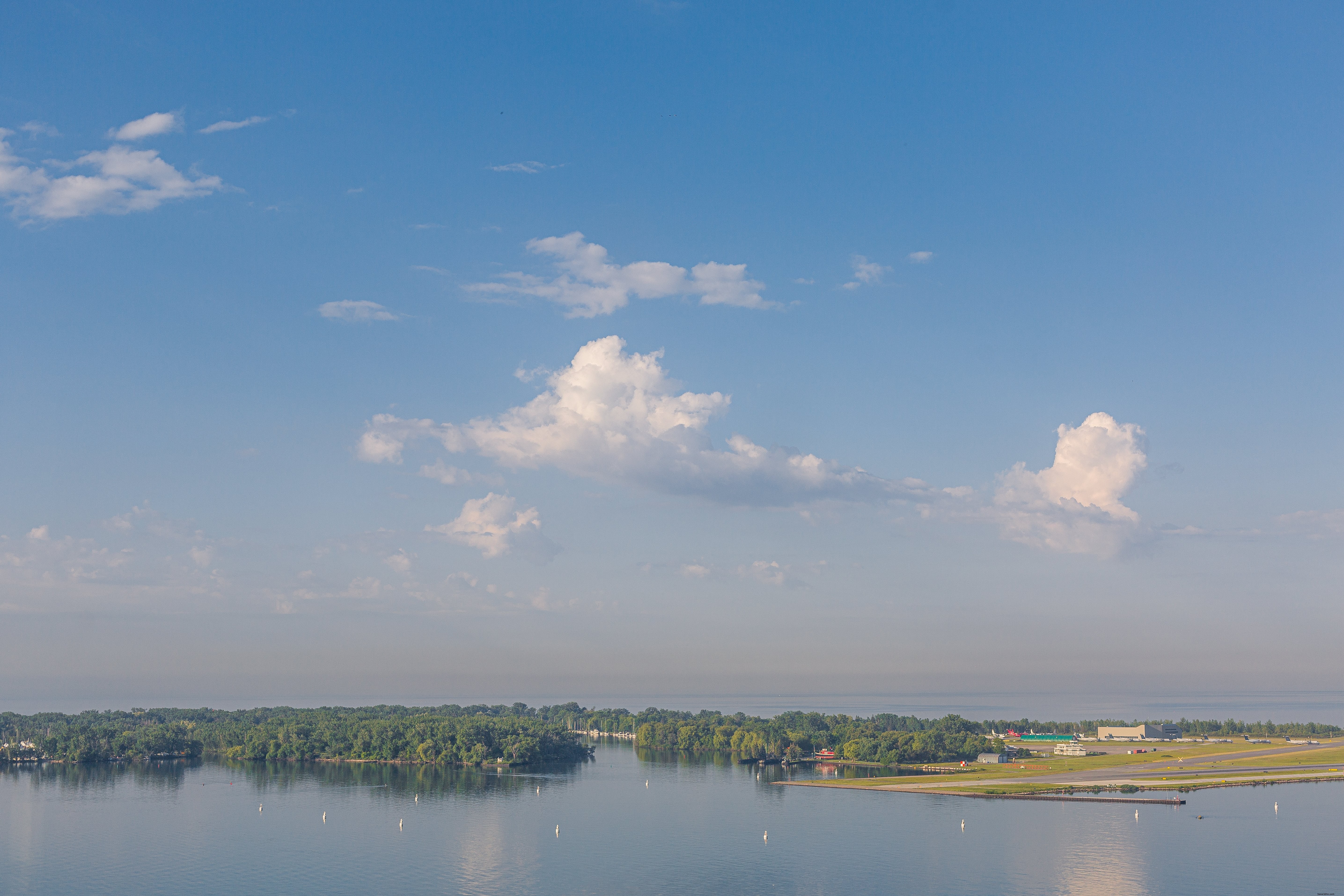 Stunning Cloudy Sky Over Serene Waters and Islands – Captivating Landscape Photo