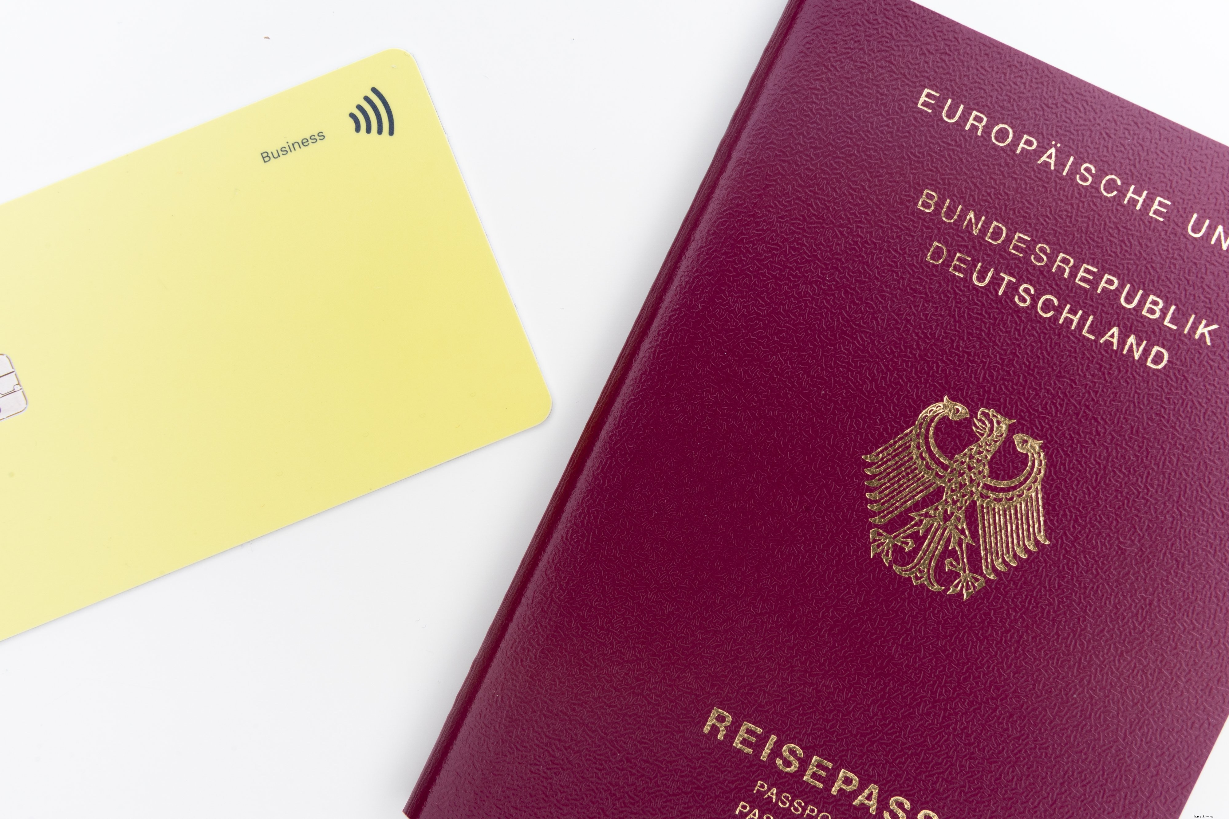 Stunning Flatlay Photo: Yellow Card with Luxurious Red Gold Passport