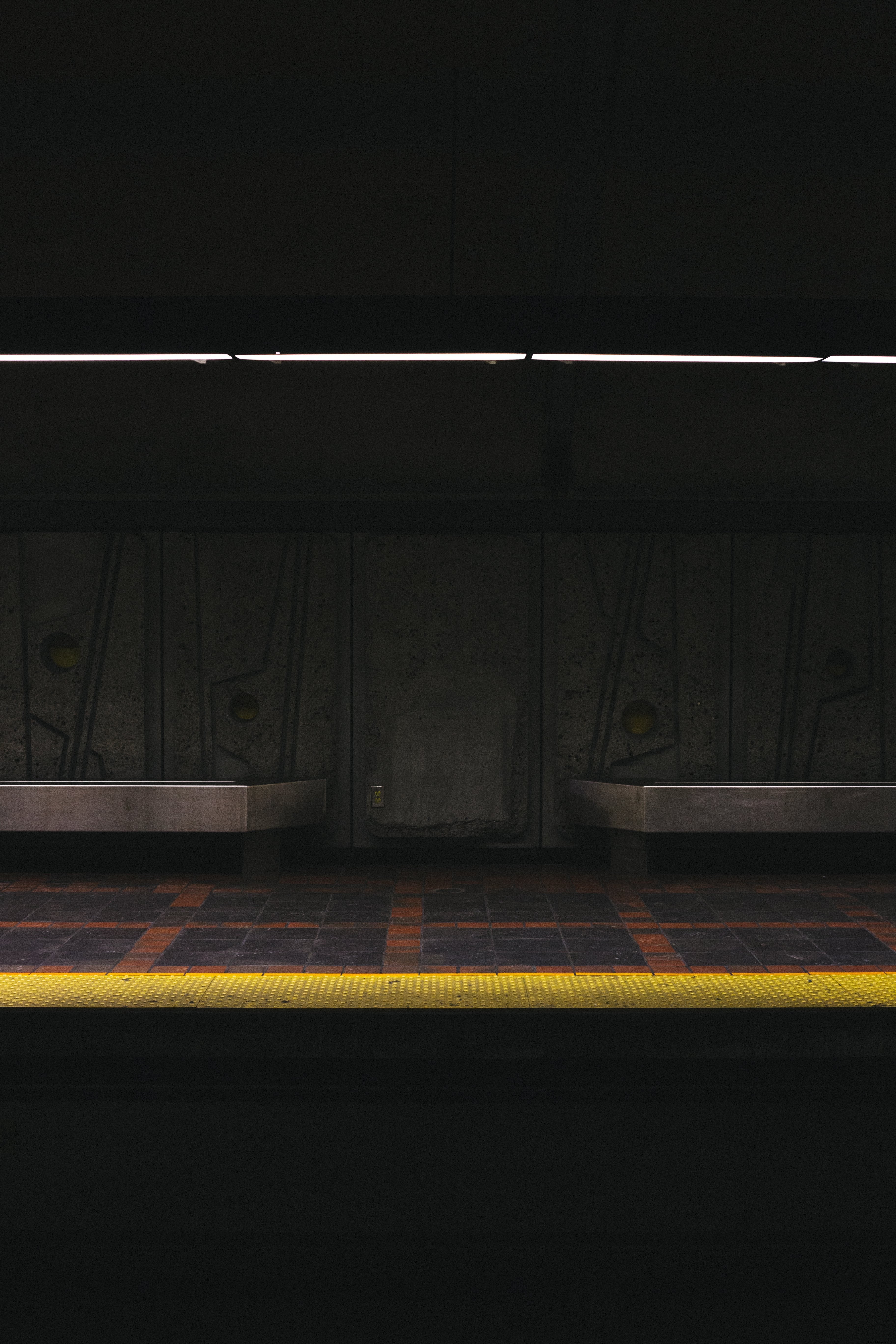 Captivating Low-Light Photography: Subway Platform at Dusk