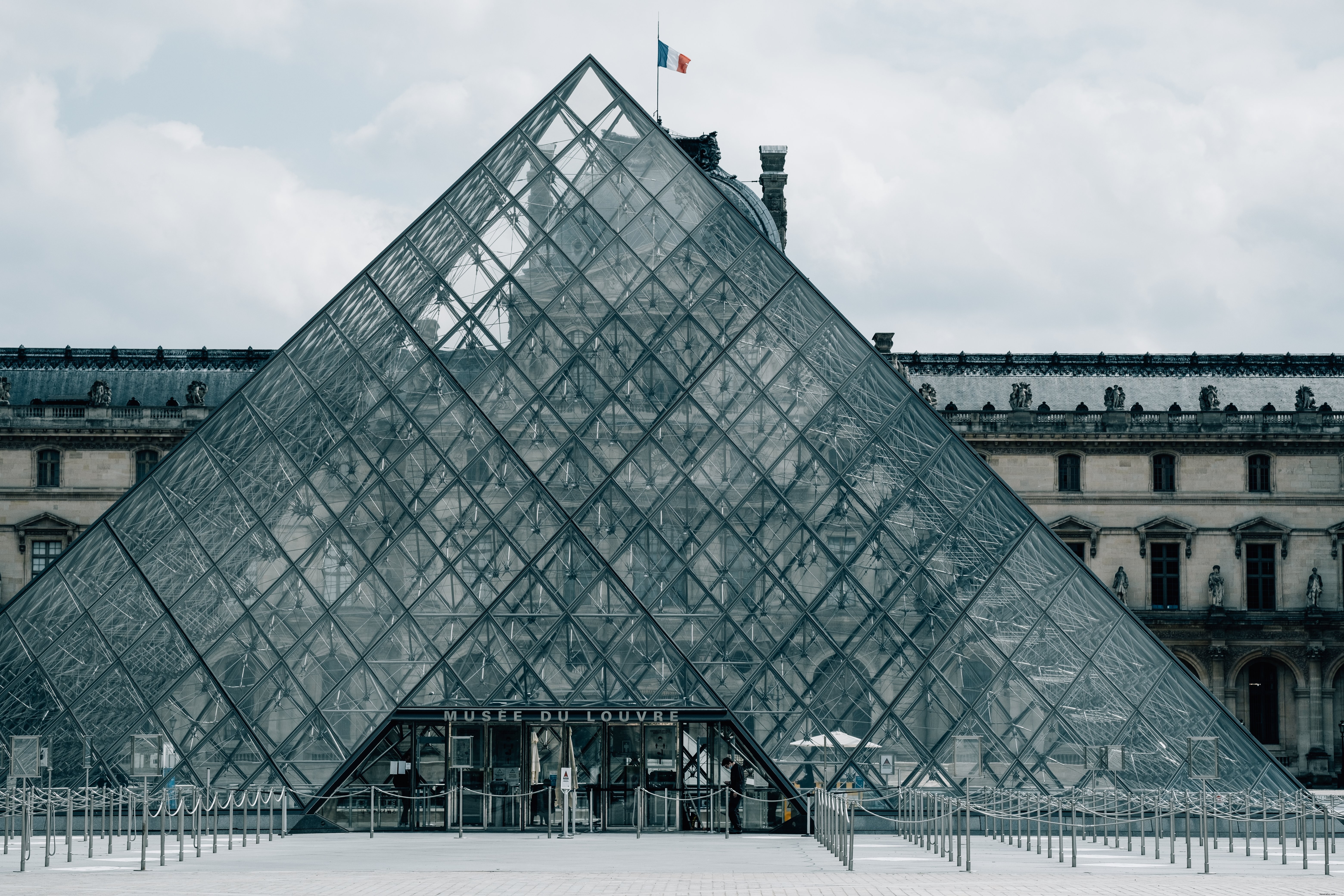 Iconic Glass Pyramid Entrance at the Louvre: Stunning Photo