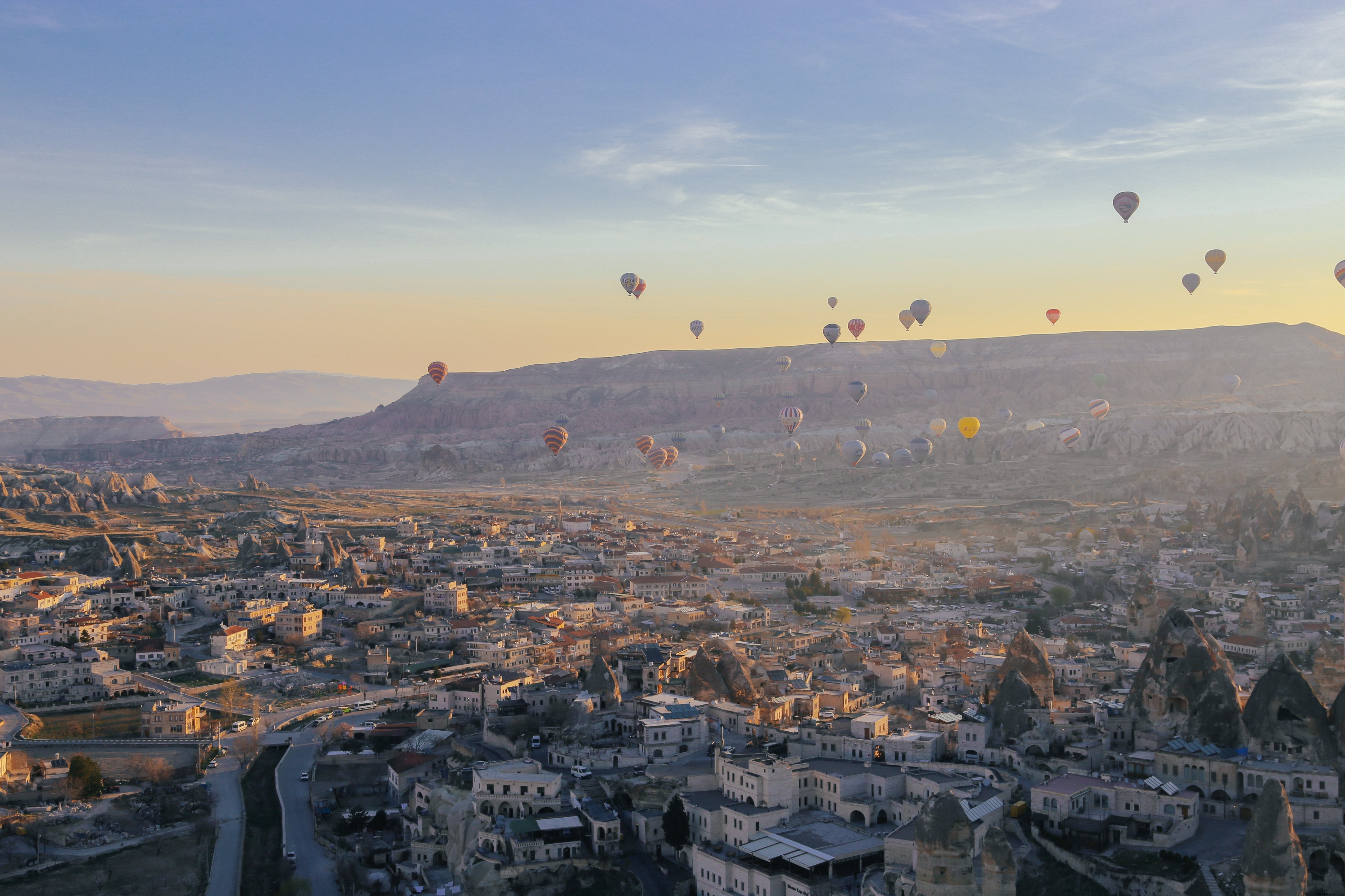 Stunning Hot Air Balloons Drifting Gracefully in the Sky – Breathtaking Aerial Photo