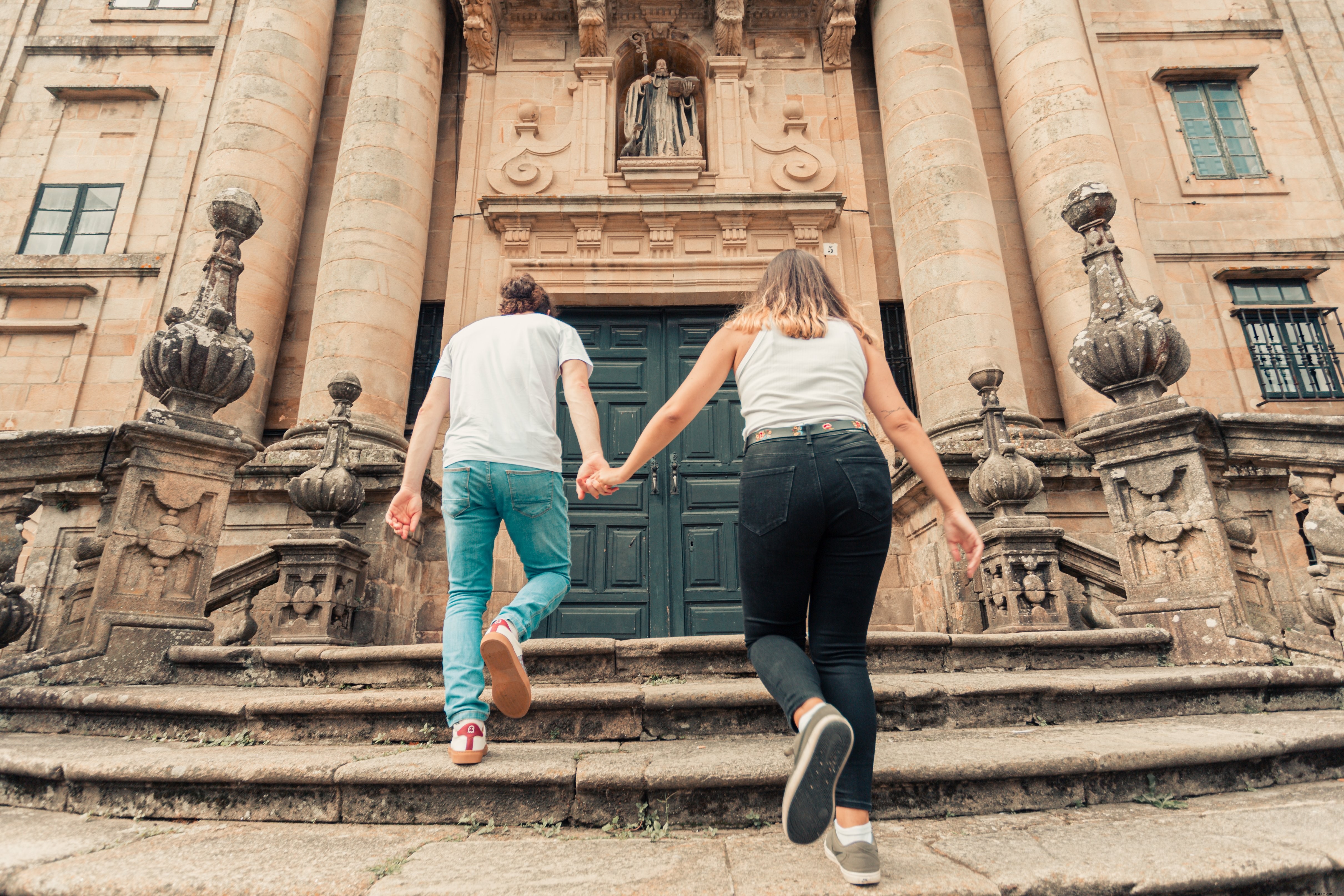 Stunning Photo: Romantic Couple Holding Hands Ascending Stone Steps