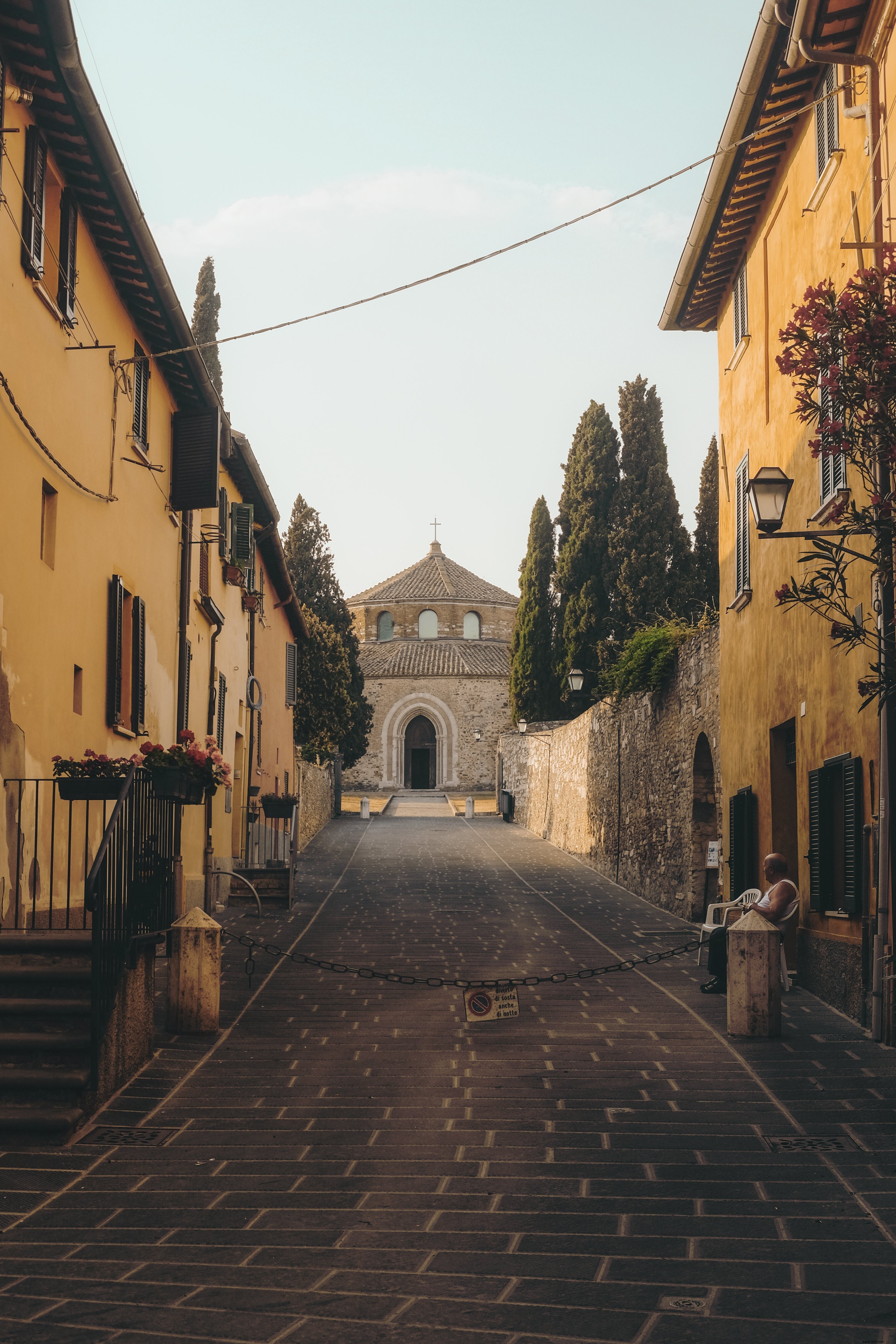 Closed Driveway Leading to an Ancient Stone Church – Stunning Photo