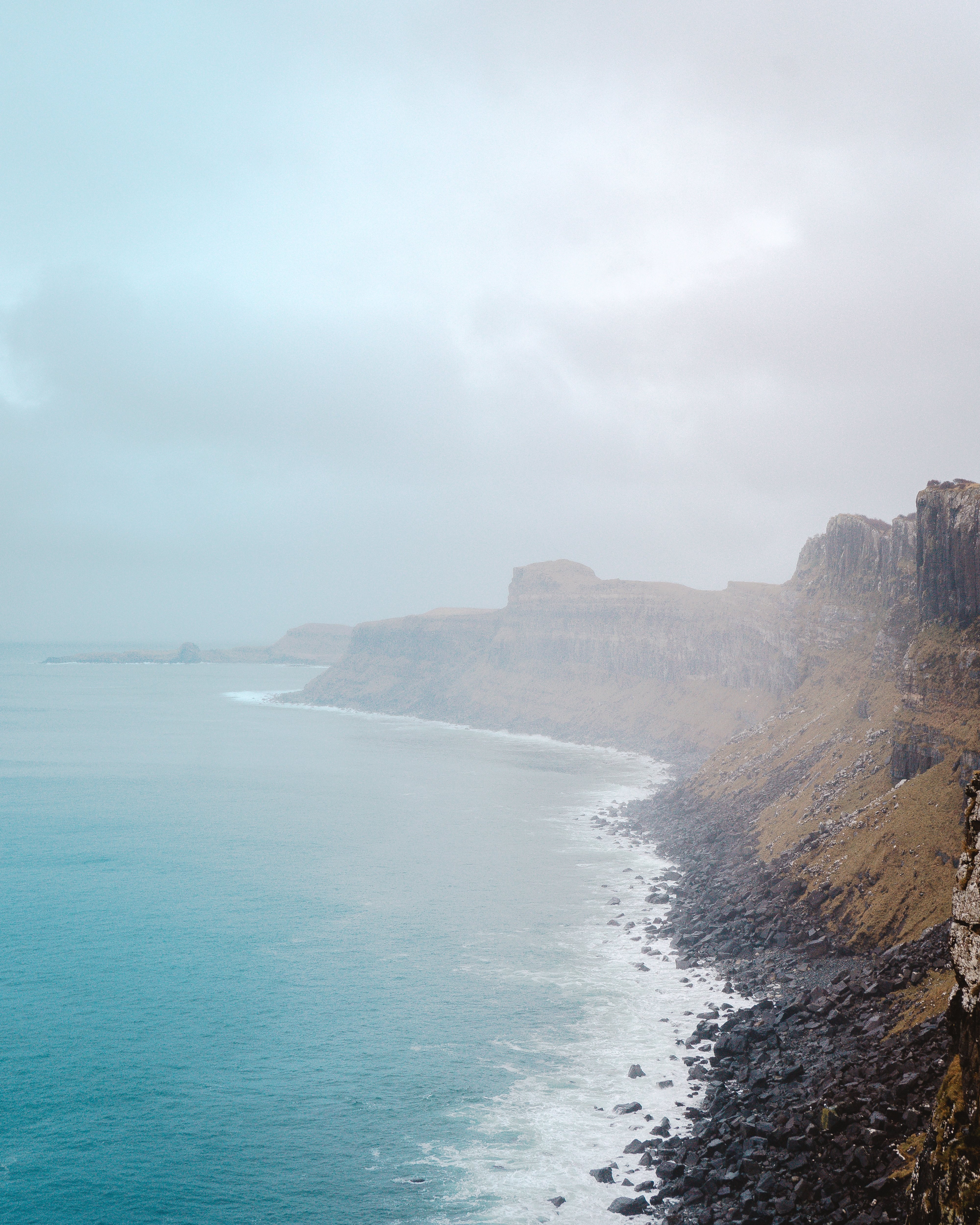 Stunning Cliffs, Black Rocks, and Ocean View Photography