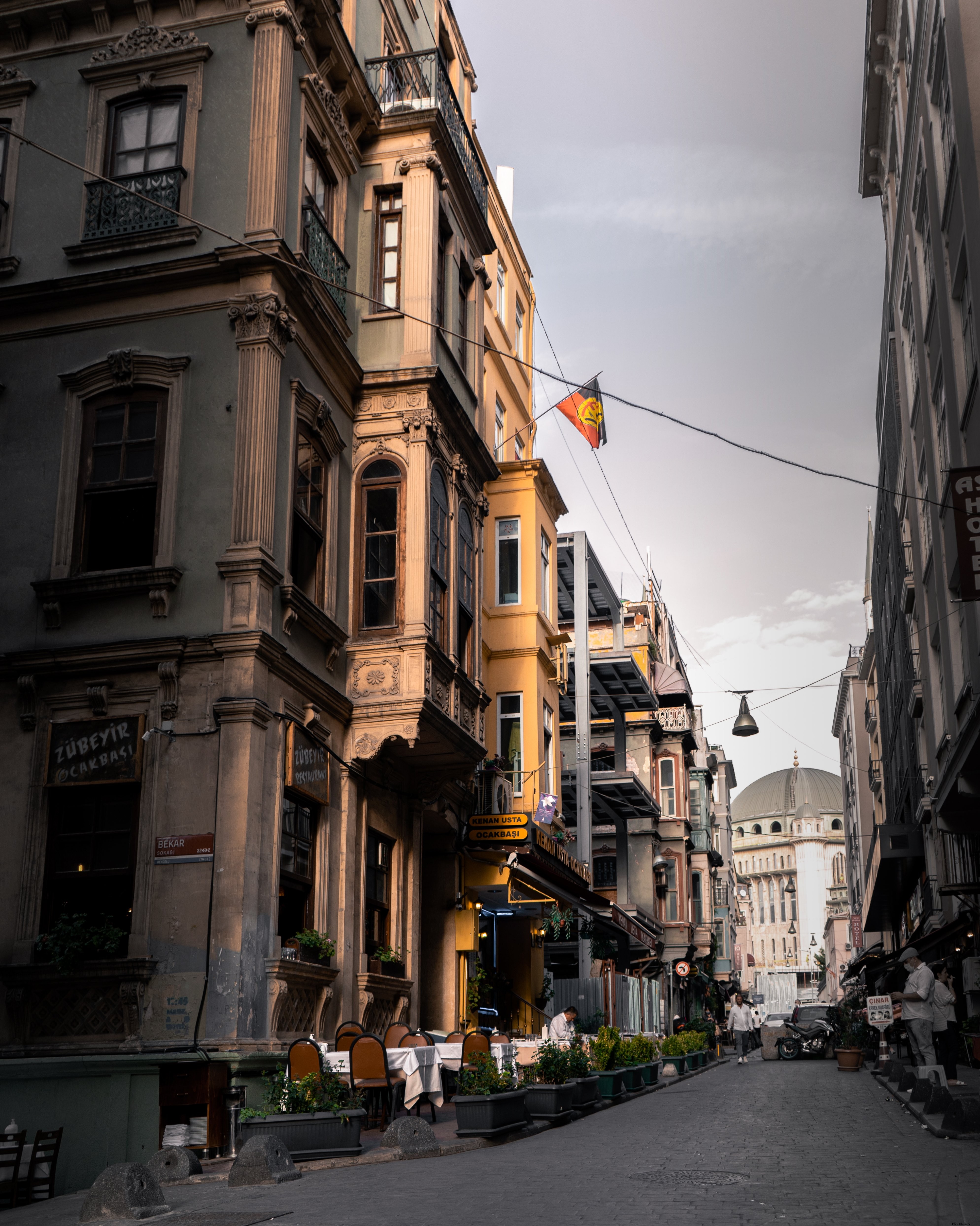 Stunning Narrow City Street Lined with Tall Rustic Buildings Photo