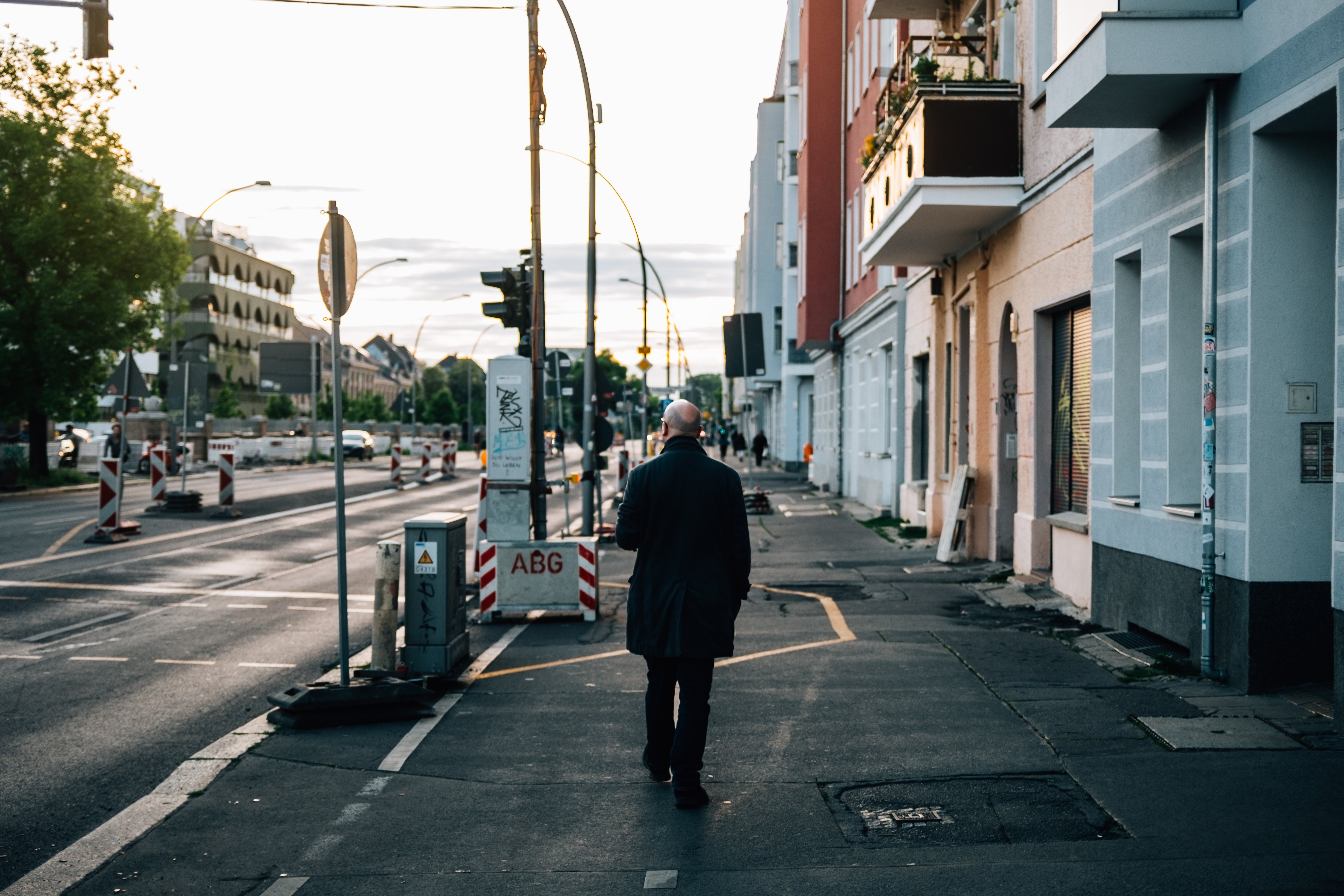 Lone Walker on a Serene City Street: Captivating Urban Photography