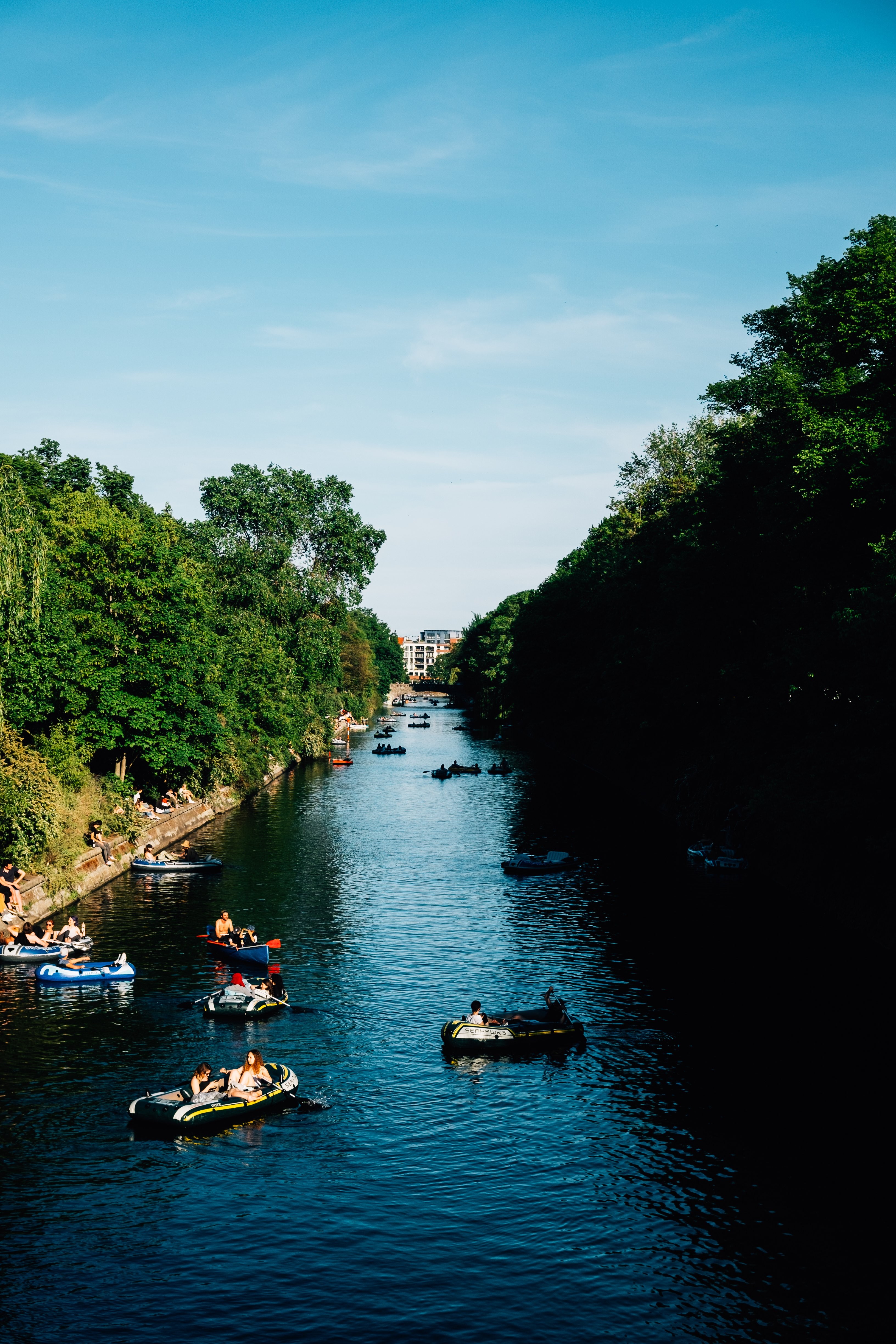 Stunning Photo of Boaters on a Vibrant Blue River