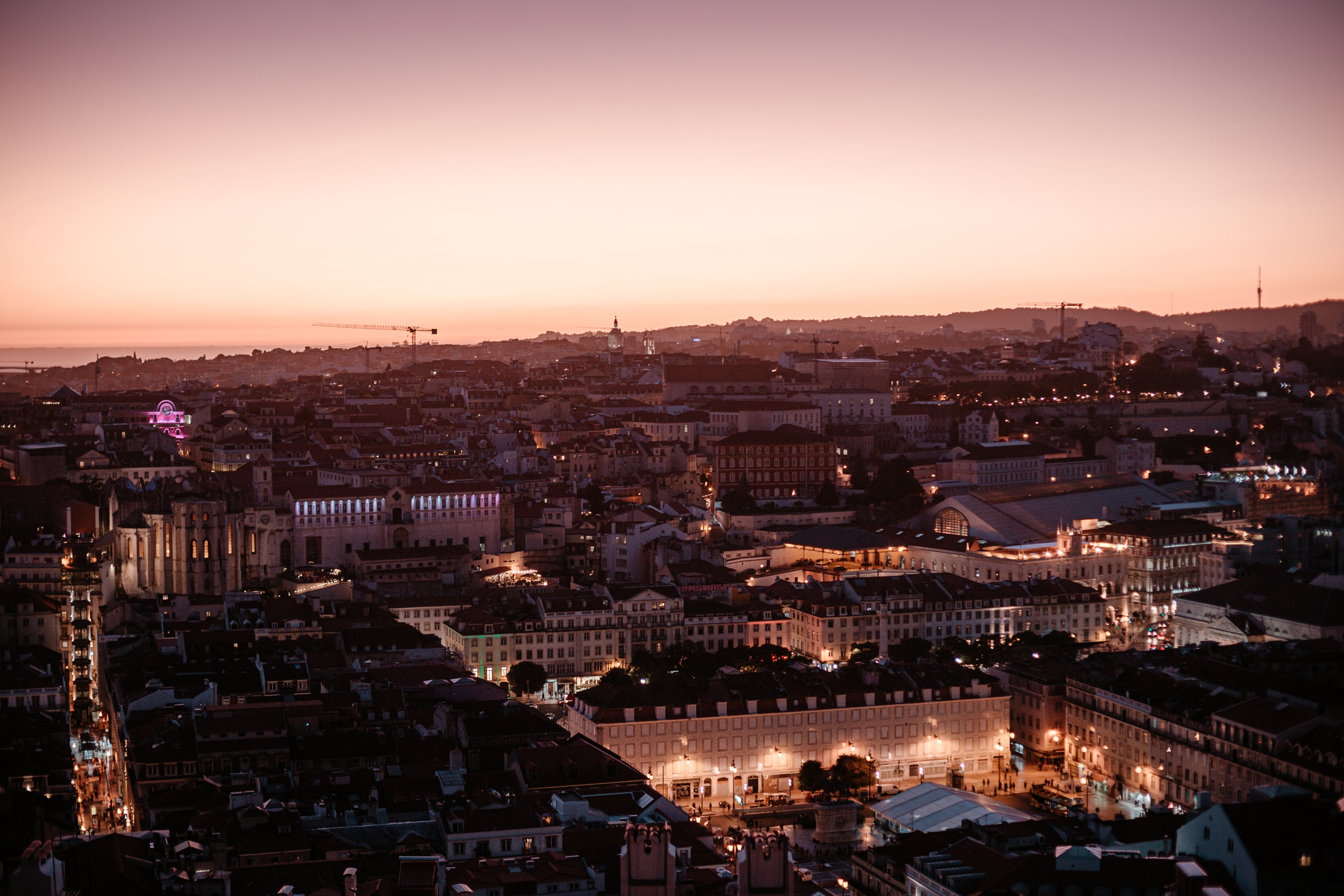 Breathtaking Aerial View of Lisbon Skyline at Sunset