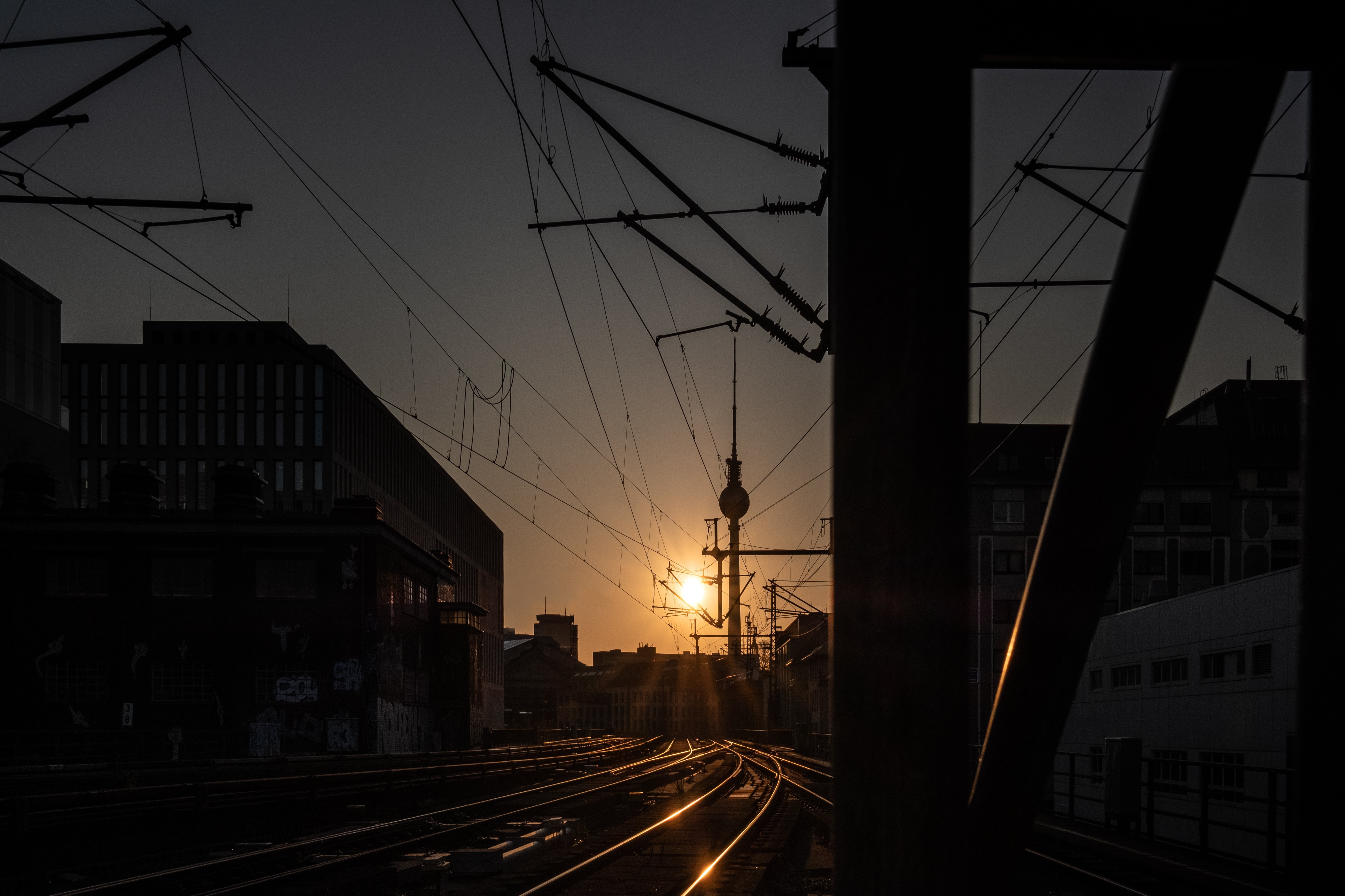 Breathtaking Sunset Over Empty Train Tracks – Stunning Landscape Photo