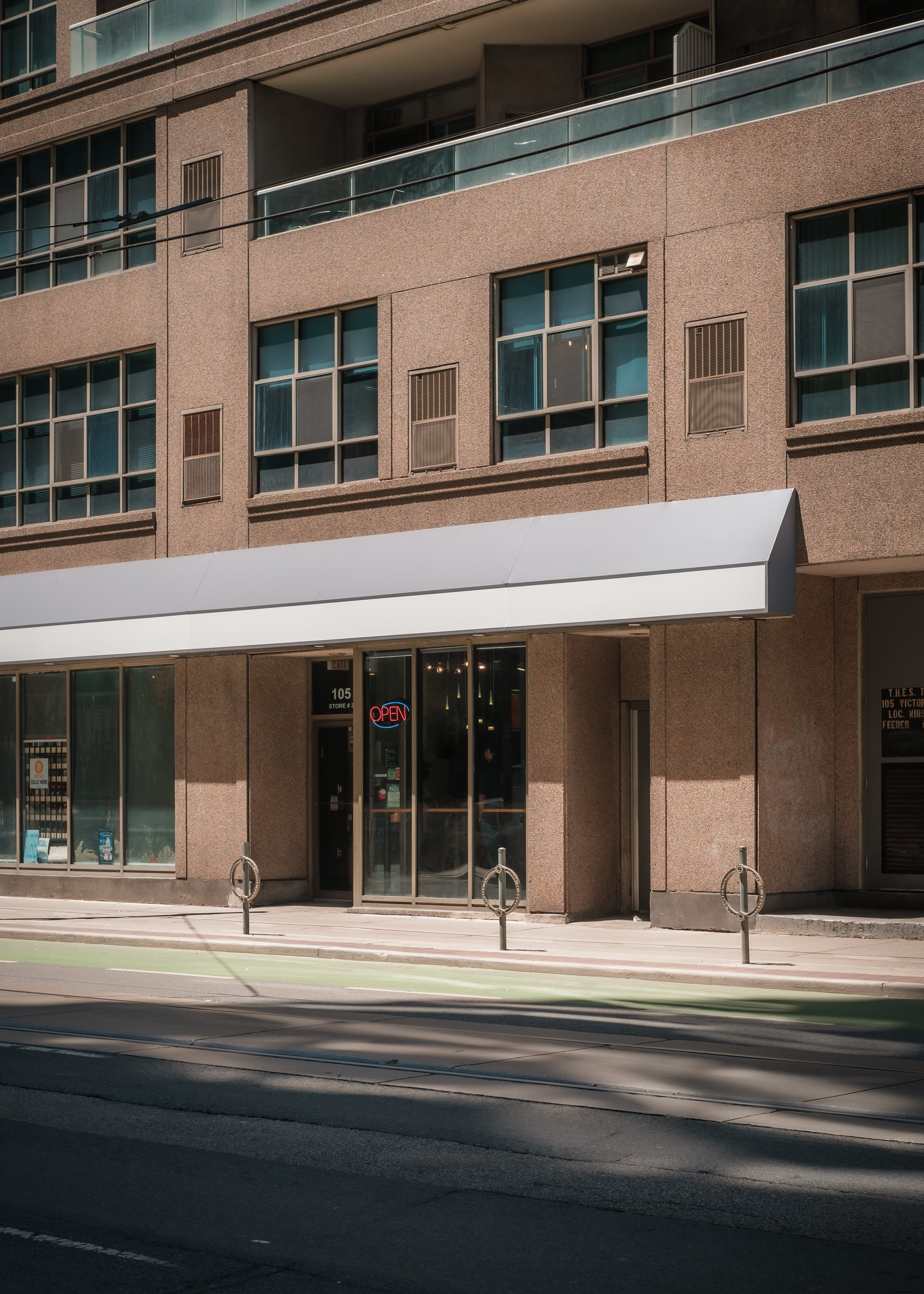 High-Resolution Photo of Brown Building on City Street