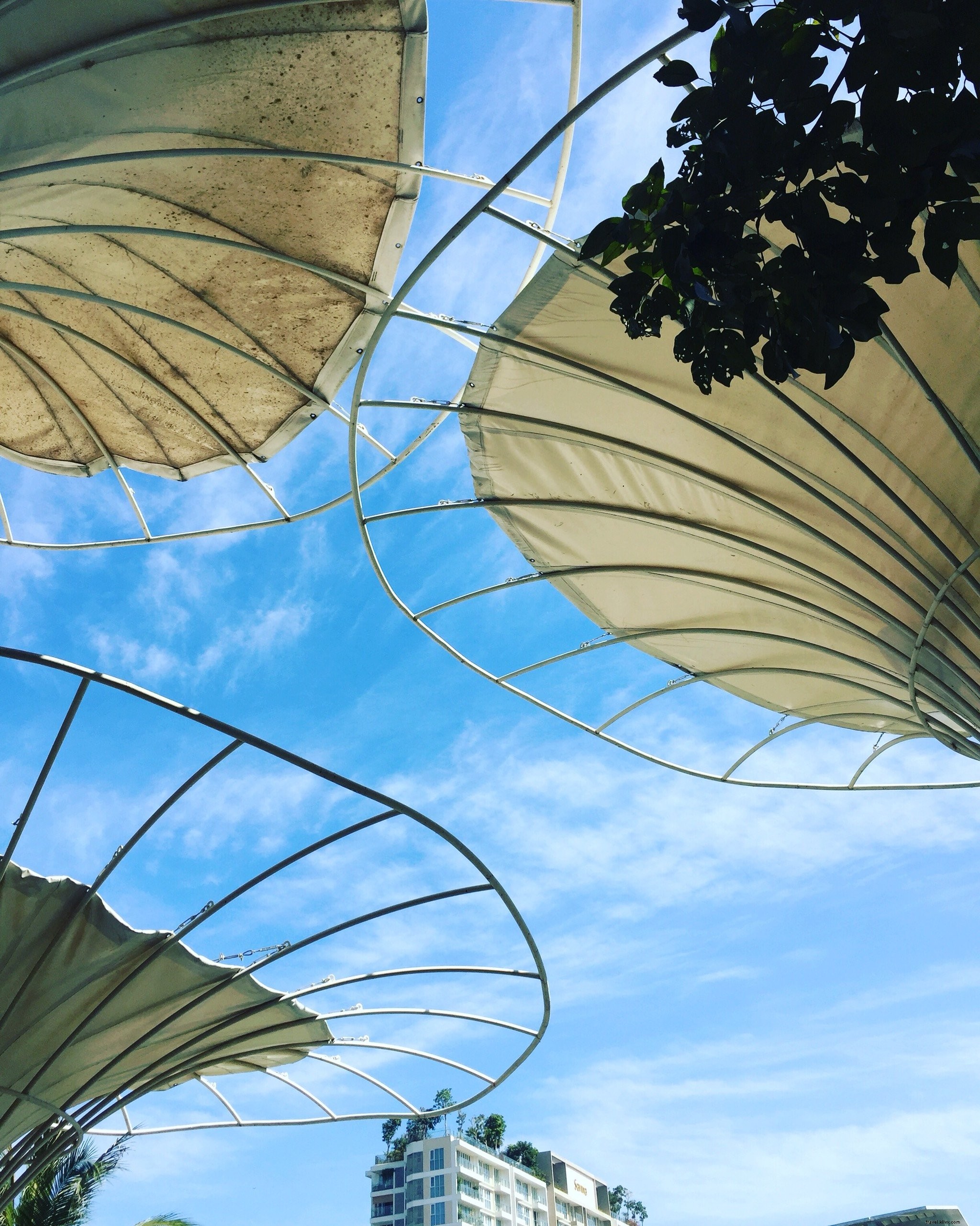 Stunning Circular Metal Structure Set Against a Vivid Blue Sky