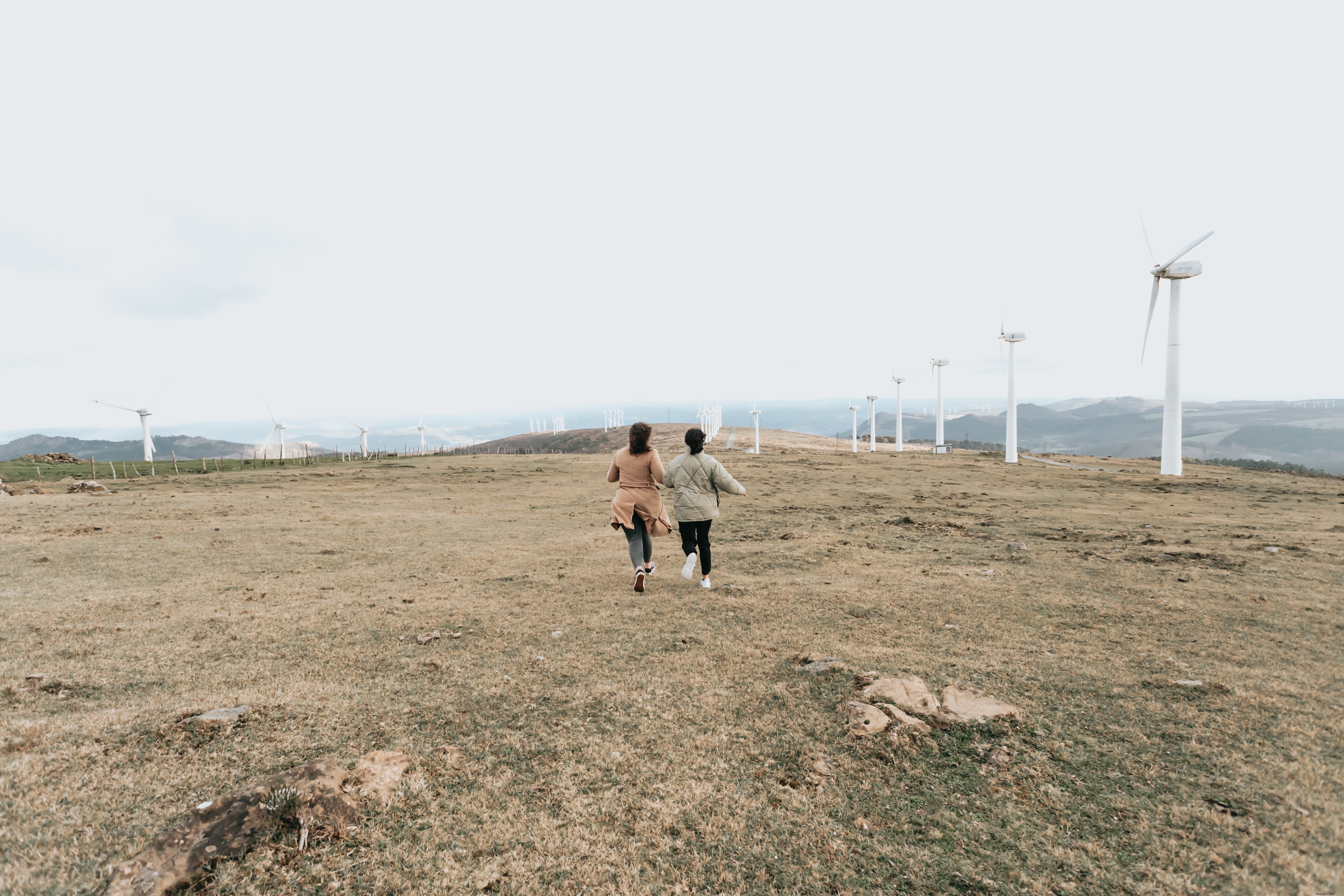 Strolling Through Majestic White Windmills: A Captivating Landscape Photo