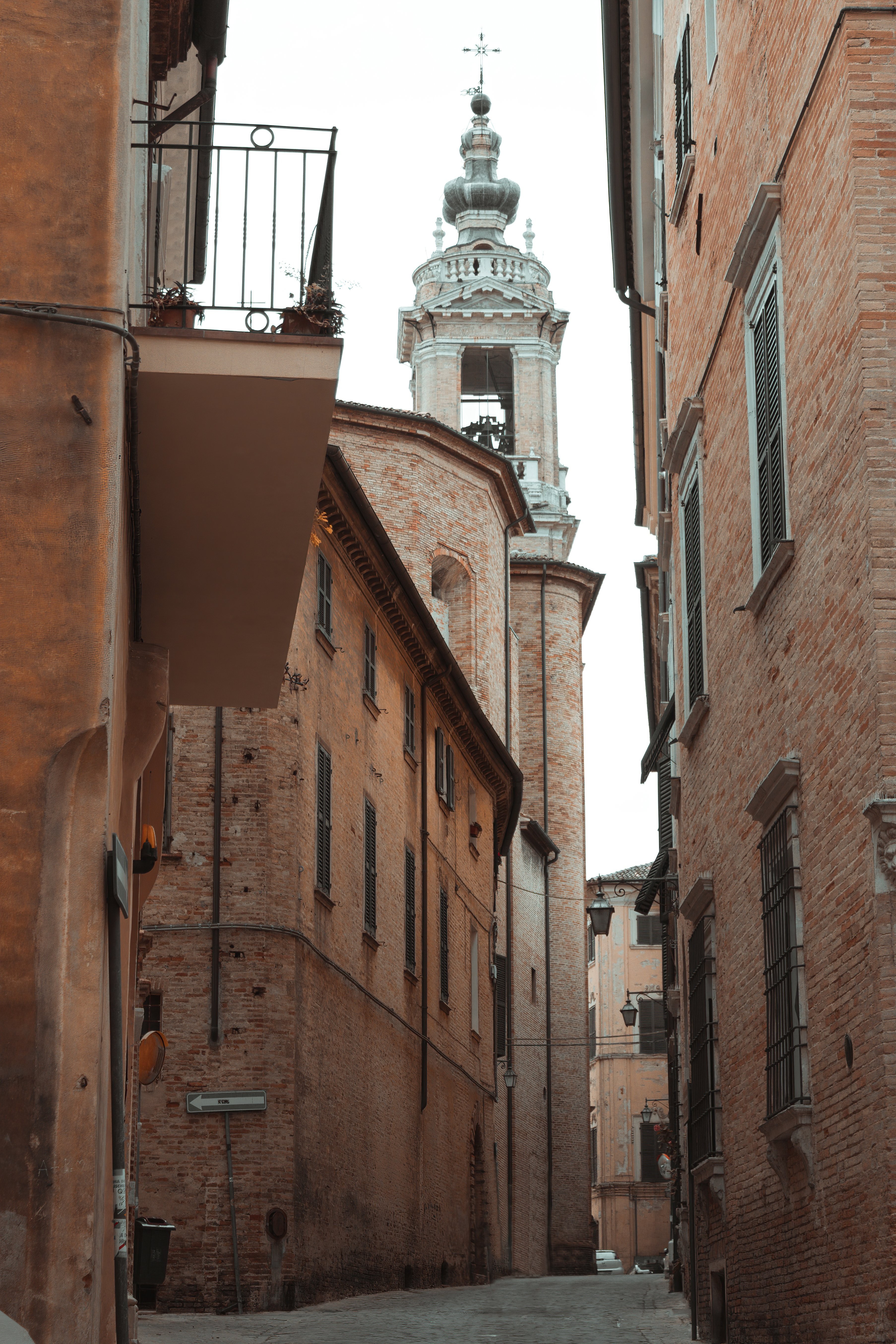 Stunning Tall Brick Structures with Elegant Bell Tower – Photo Showcase