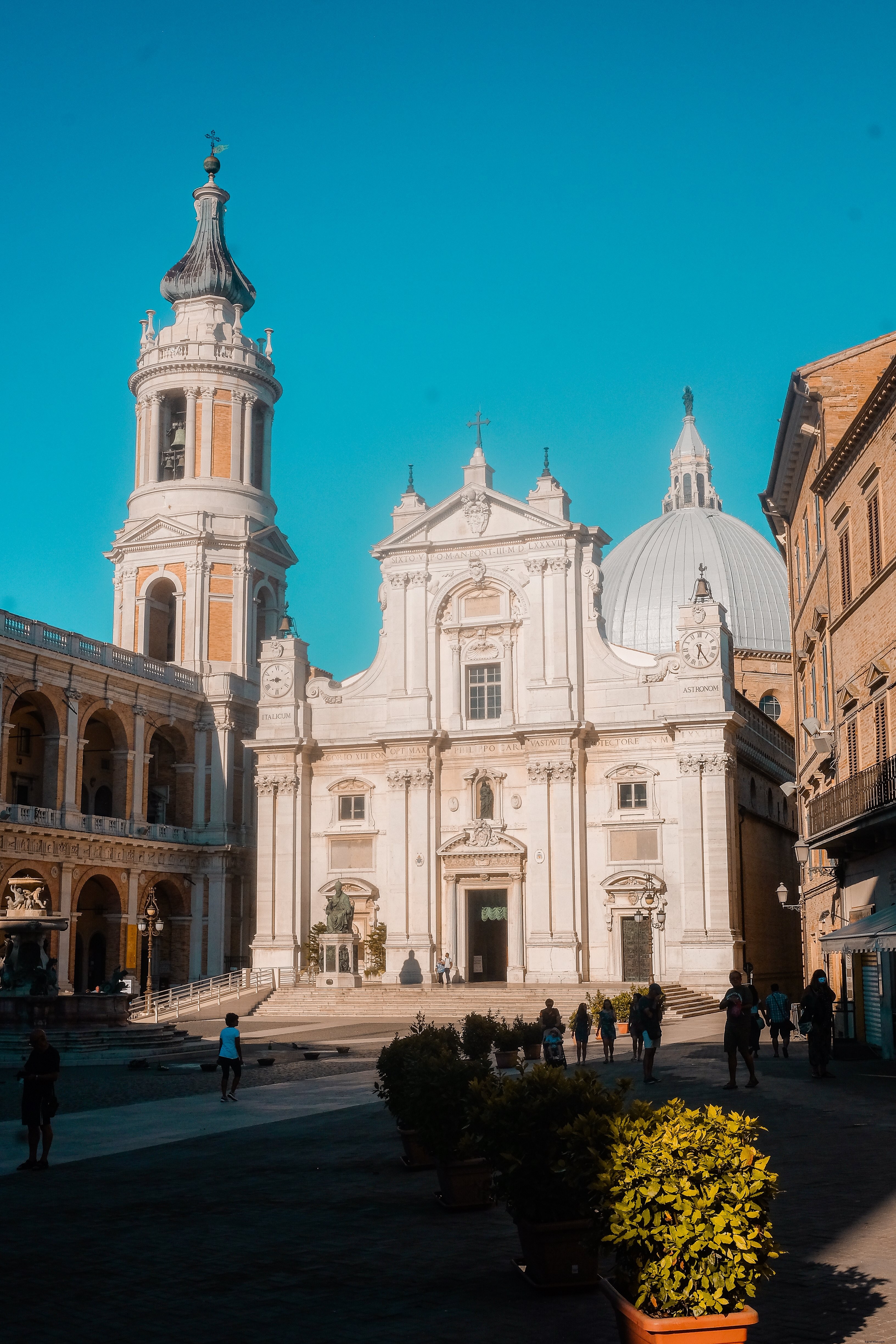 Sunny Courtyard View of a Majestic White Church