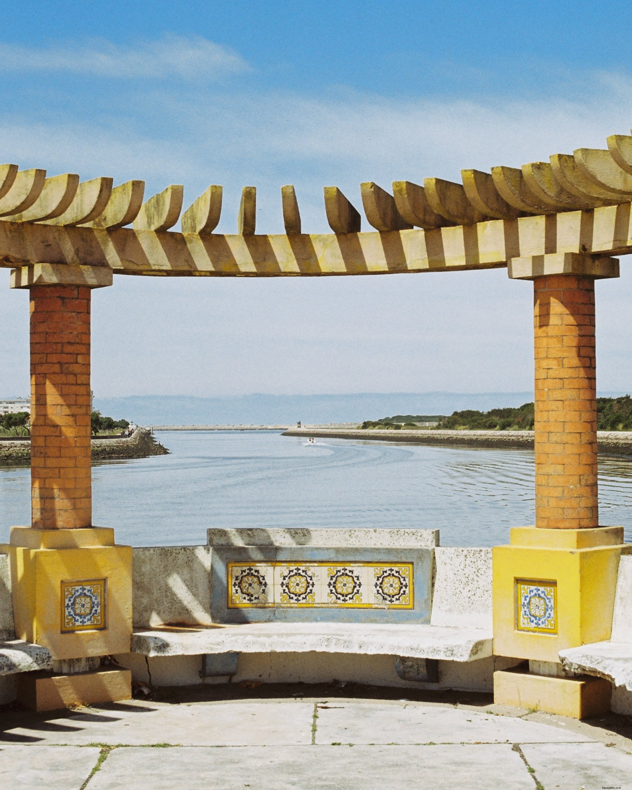 Vibrant Bench by Serene Water: Stunning Landscape Photo
