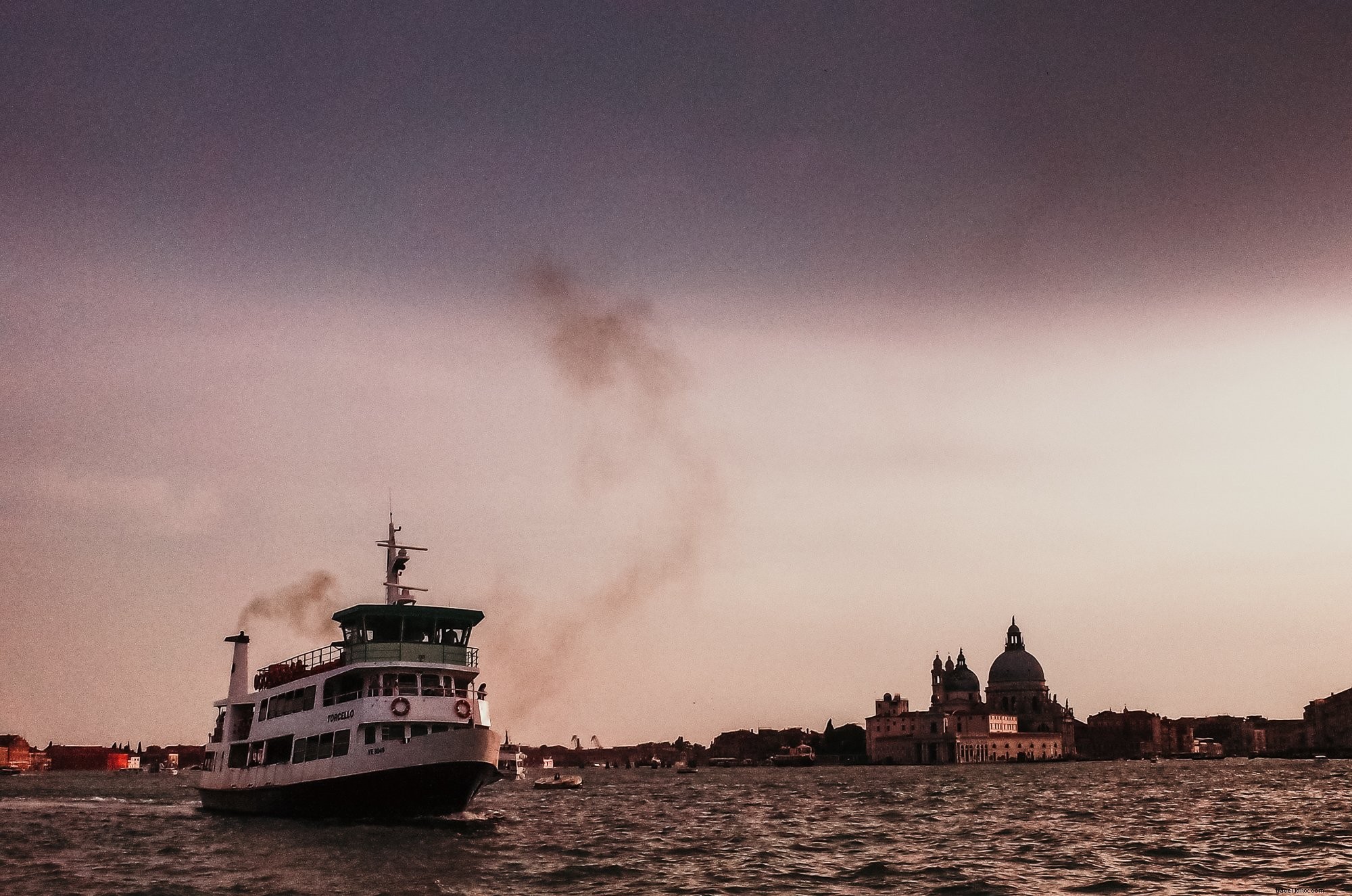 Stunning Night View of a Three-Storey Boat on Calm Waters
