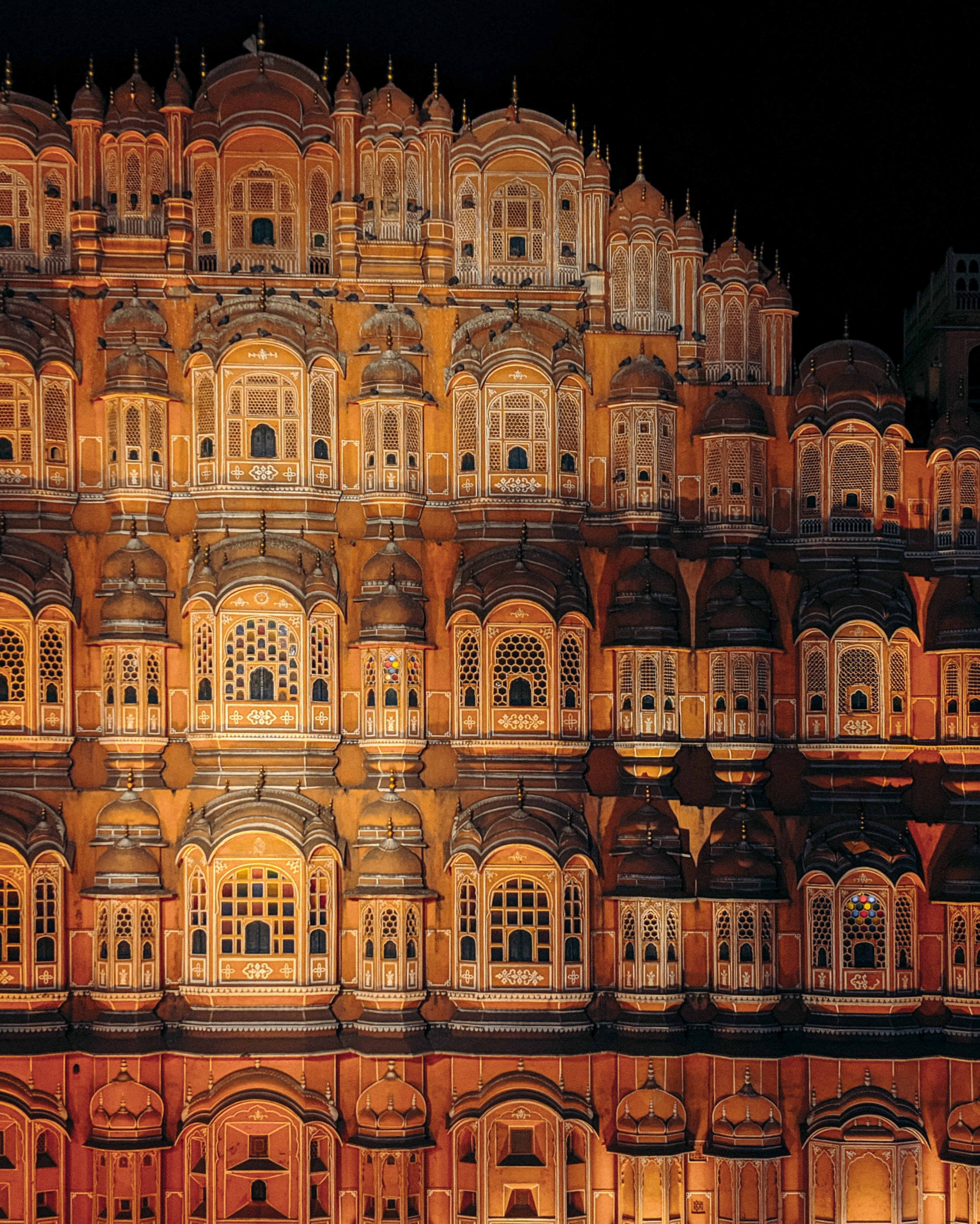 Elegant Building Illuminated at Night – Stunning Photo