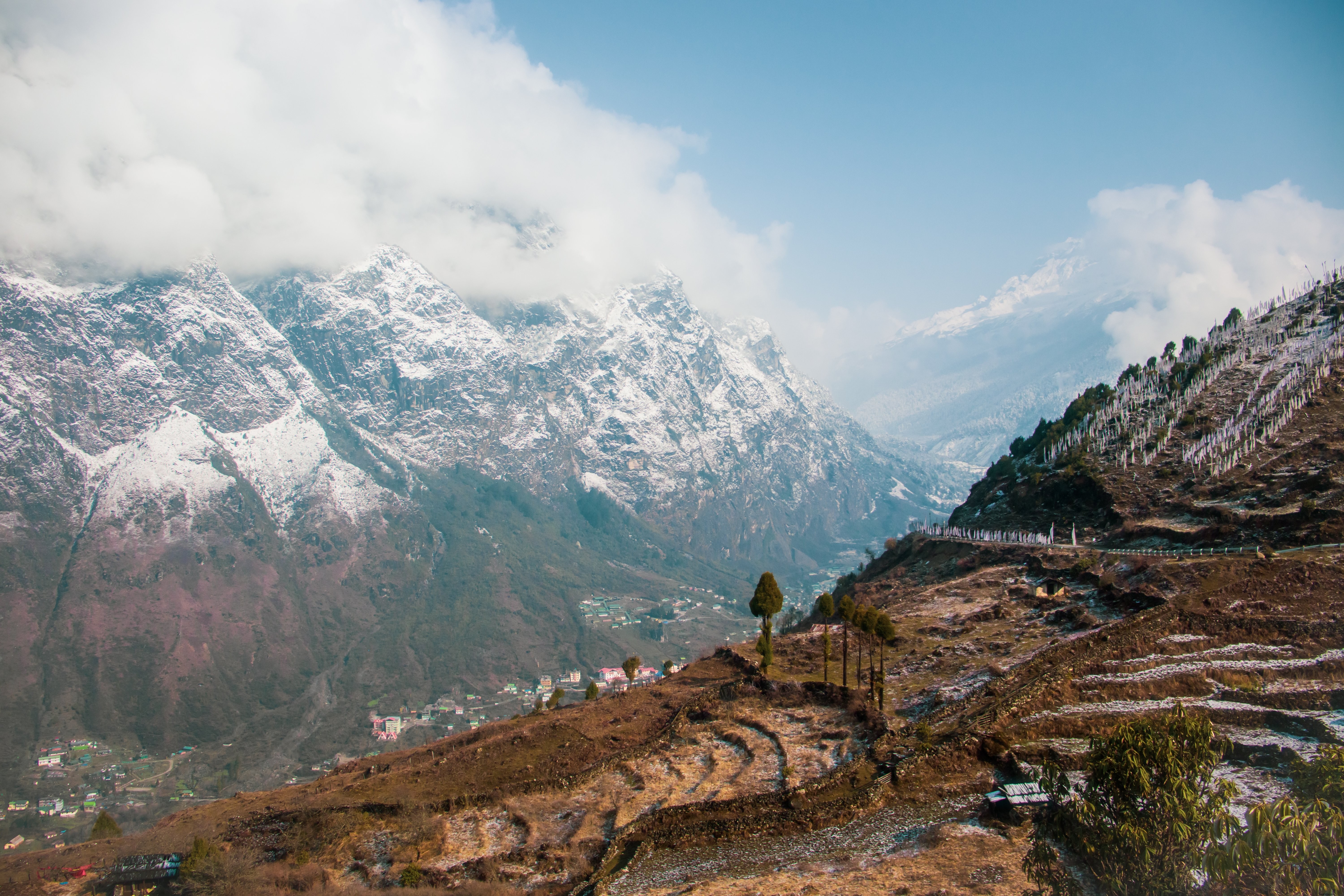 Majestic Mountains Surrounding a Village in the Valley - Stunning Landscape