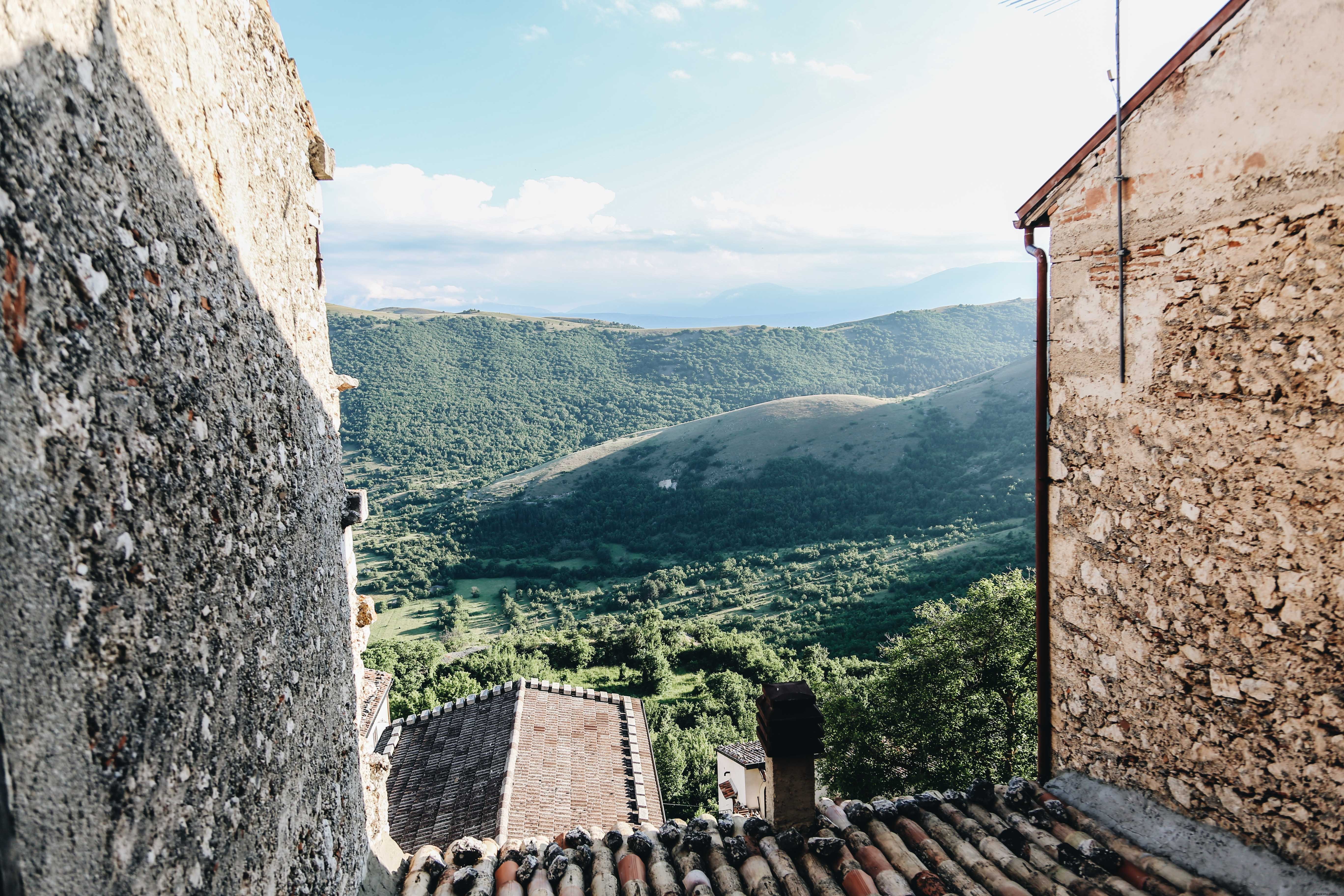 Stunning Landscape Photo: Worn Houses Framed by Nature