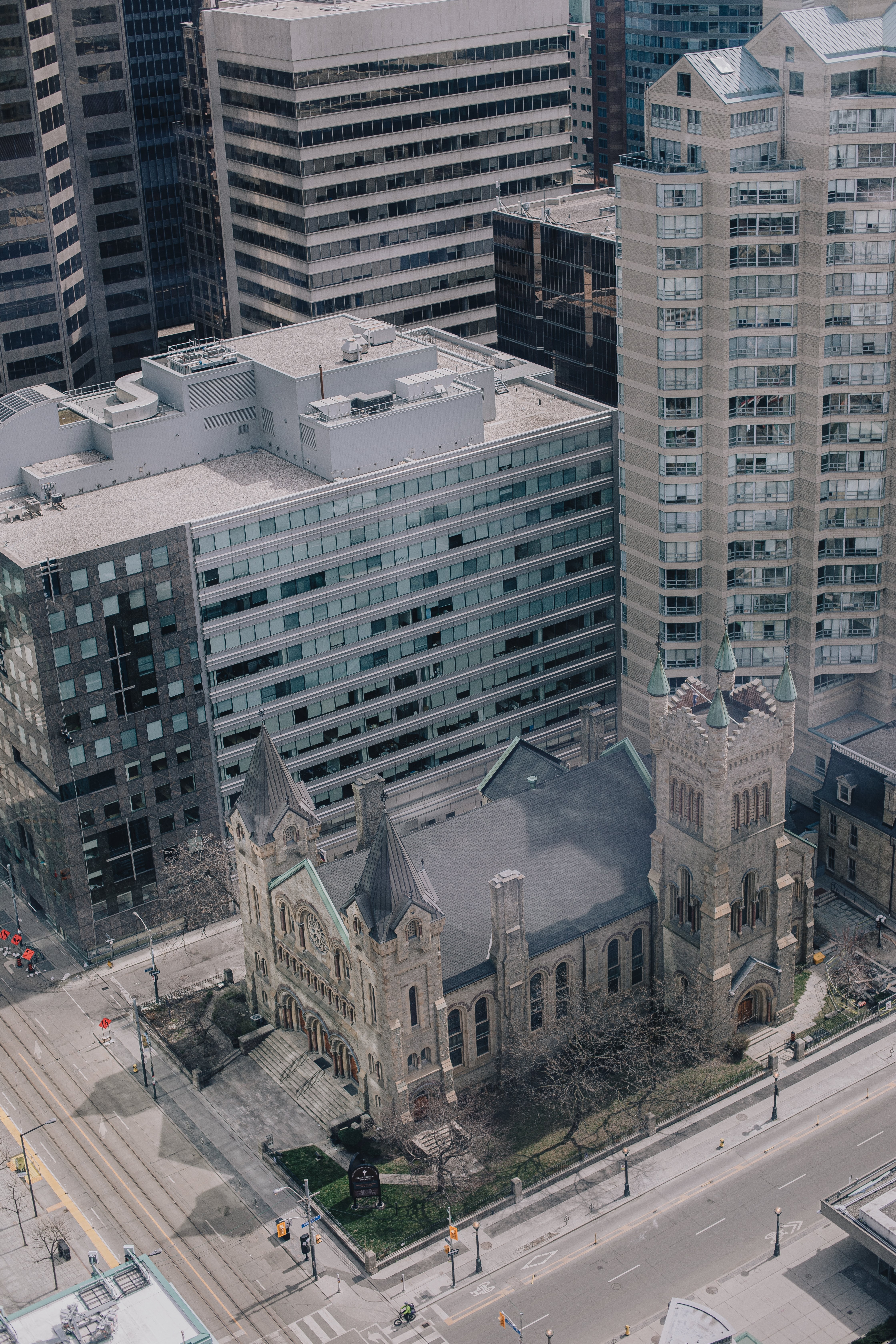 Stunning Aerial Shot of Church Surrounded by Tall Buildings