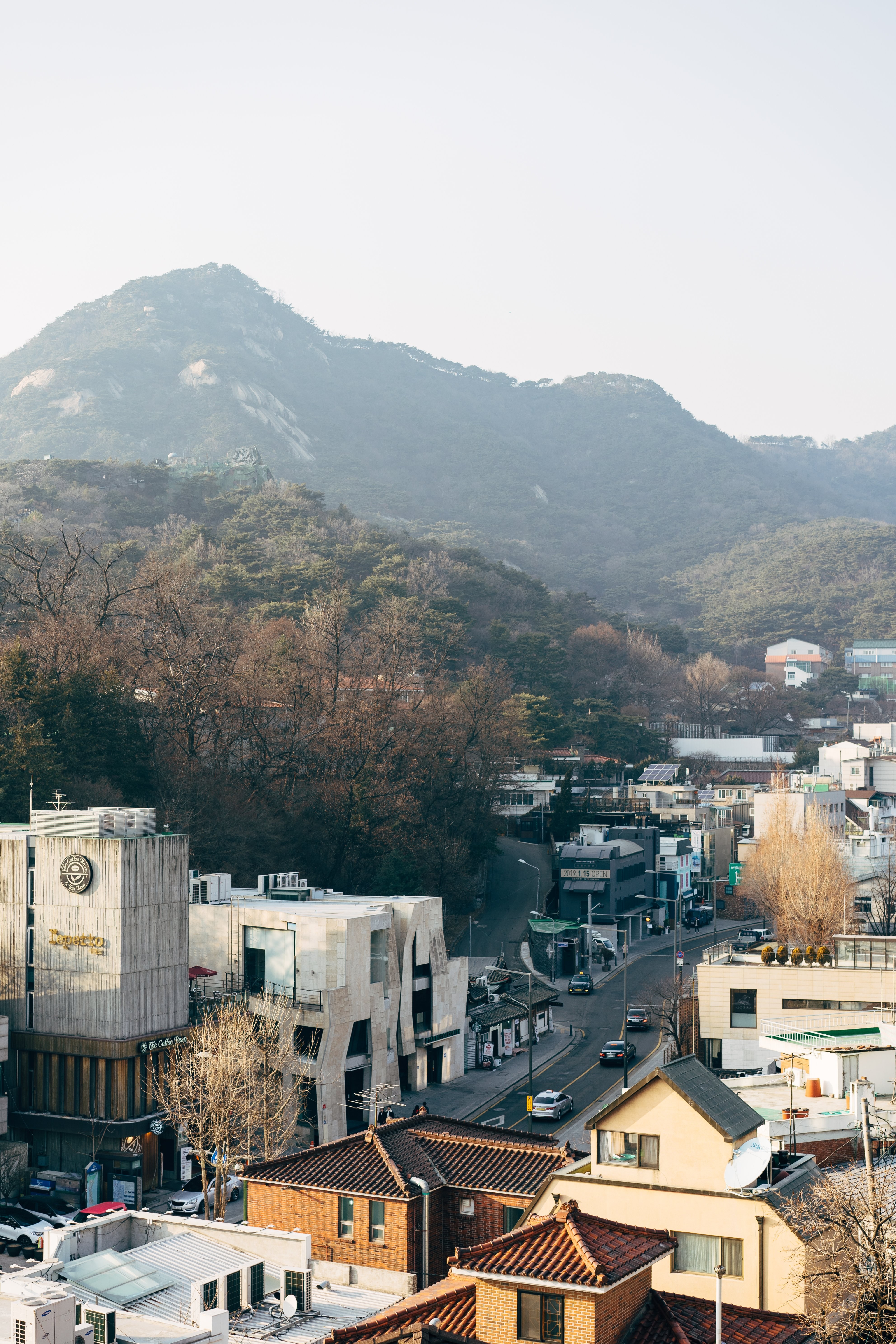 Stunning Photo of a Town Nestled Beneath a Mountain