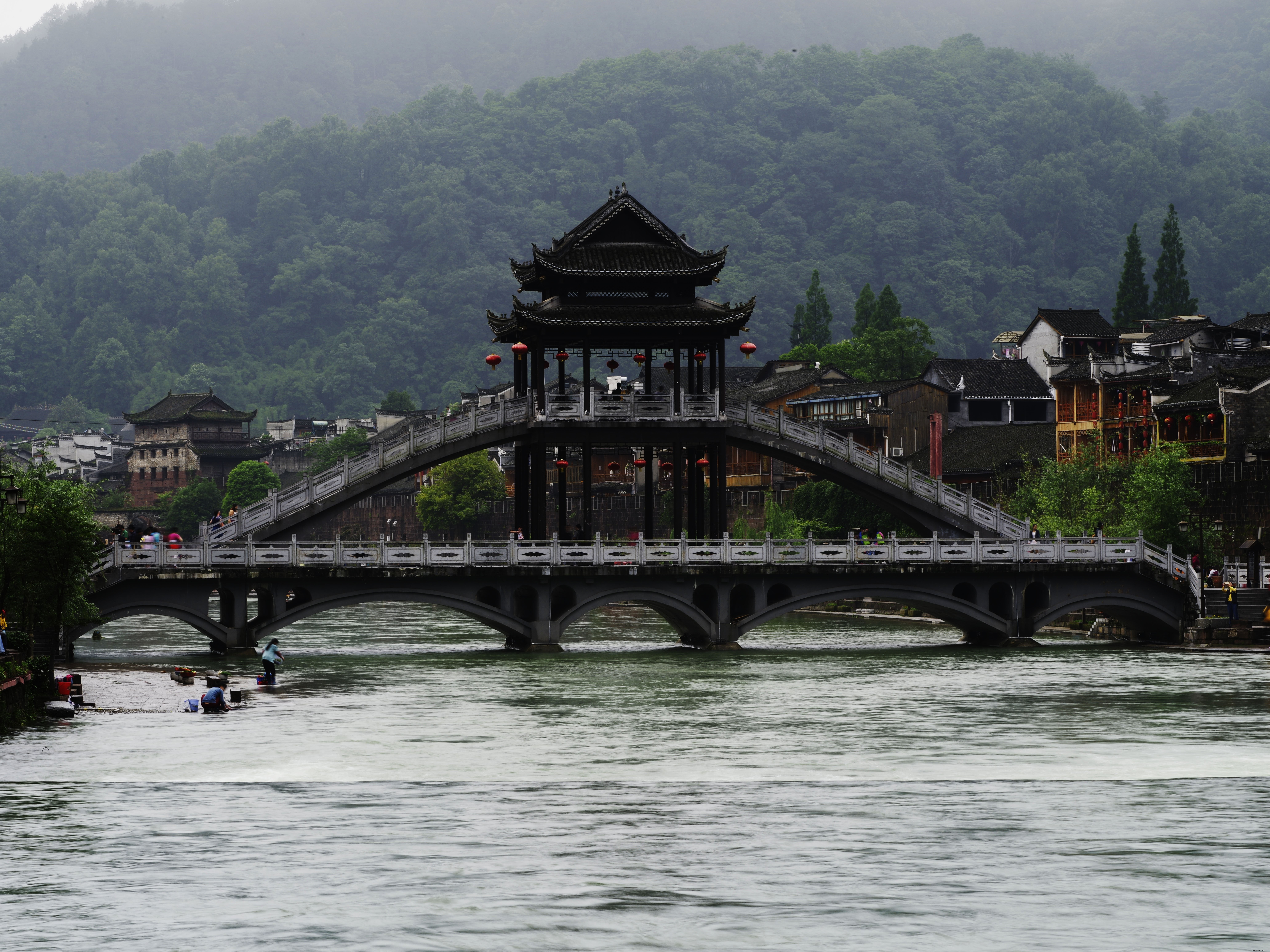 Stunning Photo of Oriental Bridge Amidst Majestic Mountains