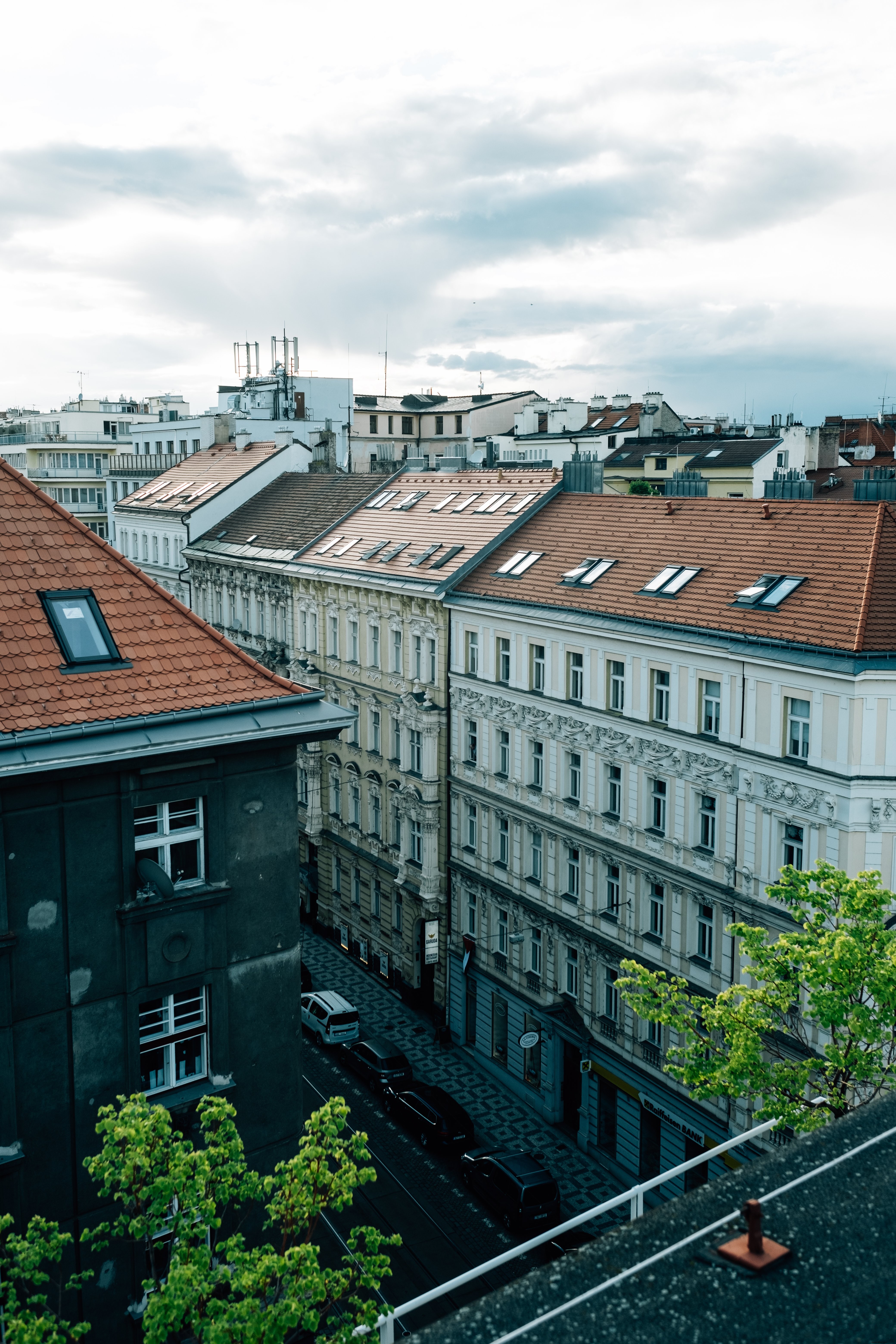 White Building with Skylights and Rustic Roofs – Architectural Photography