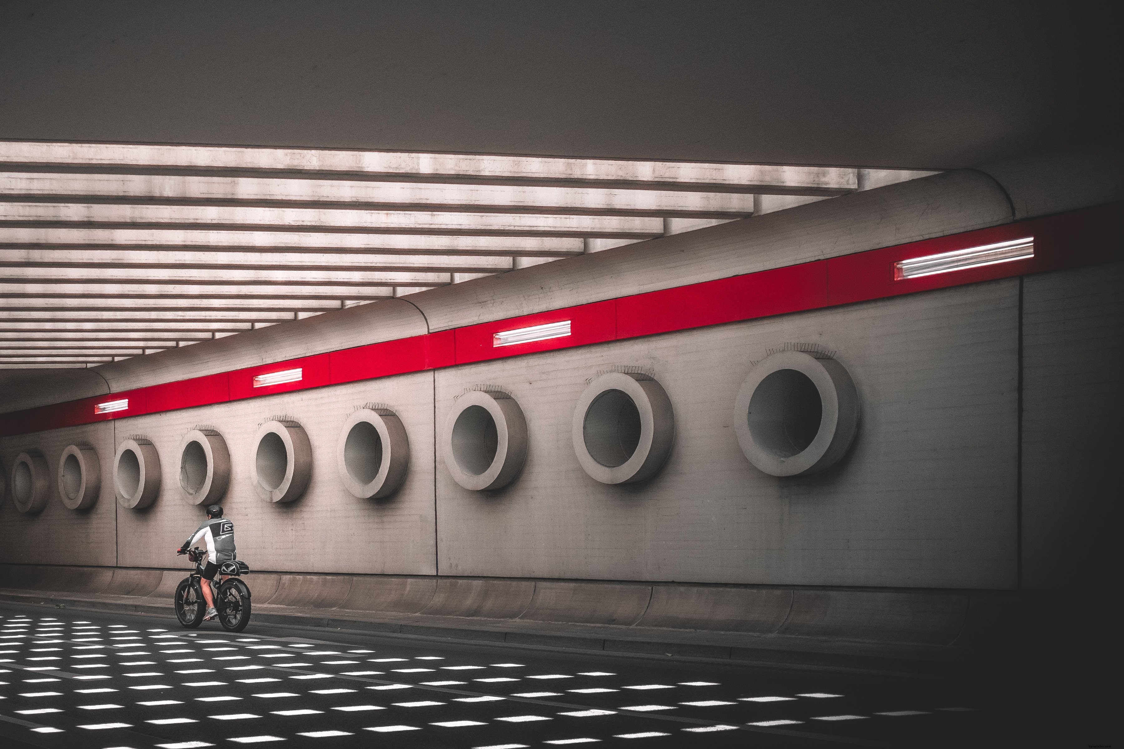 Cyclist Navigates a Majestic Underpass – Stunning Photo