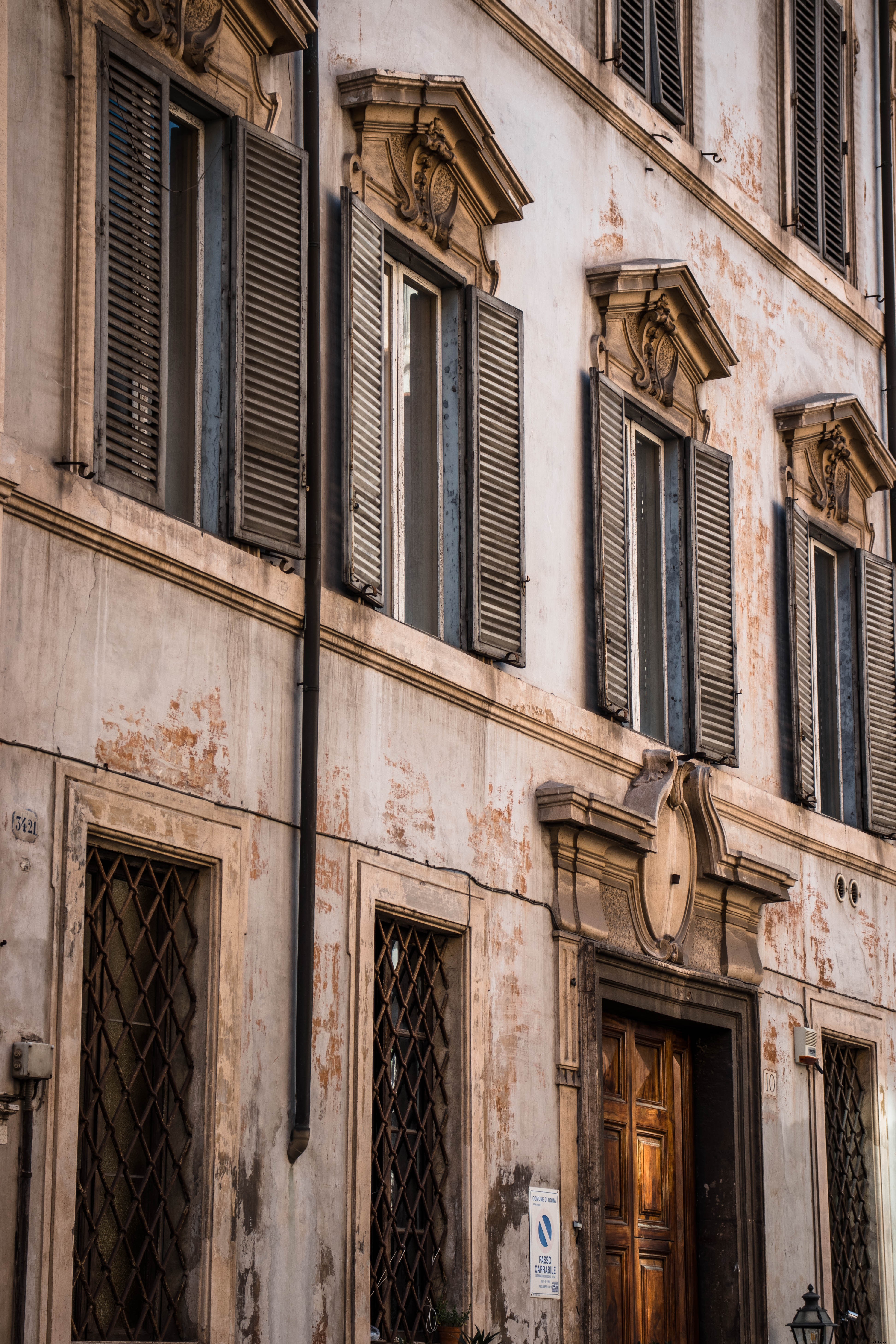 Rustic Building with Wooden Door and Windows – Stunning Architectural Photo