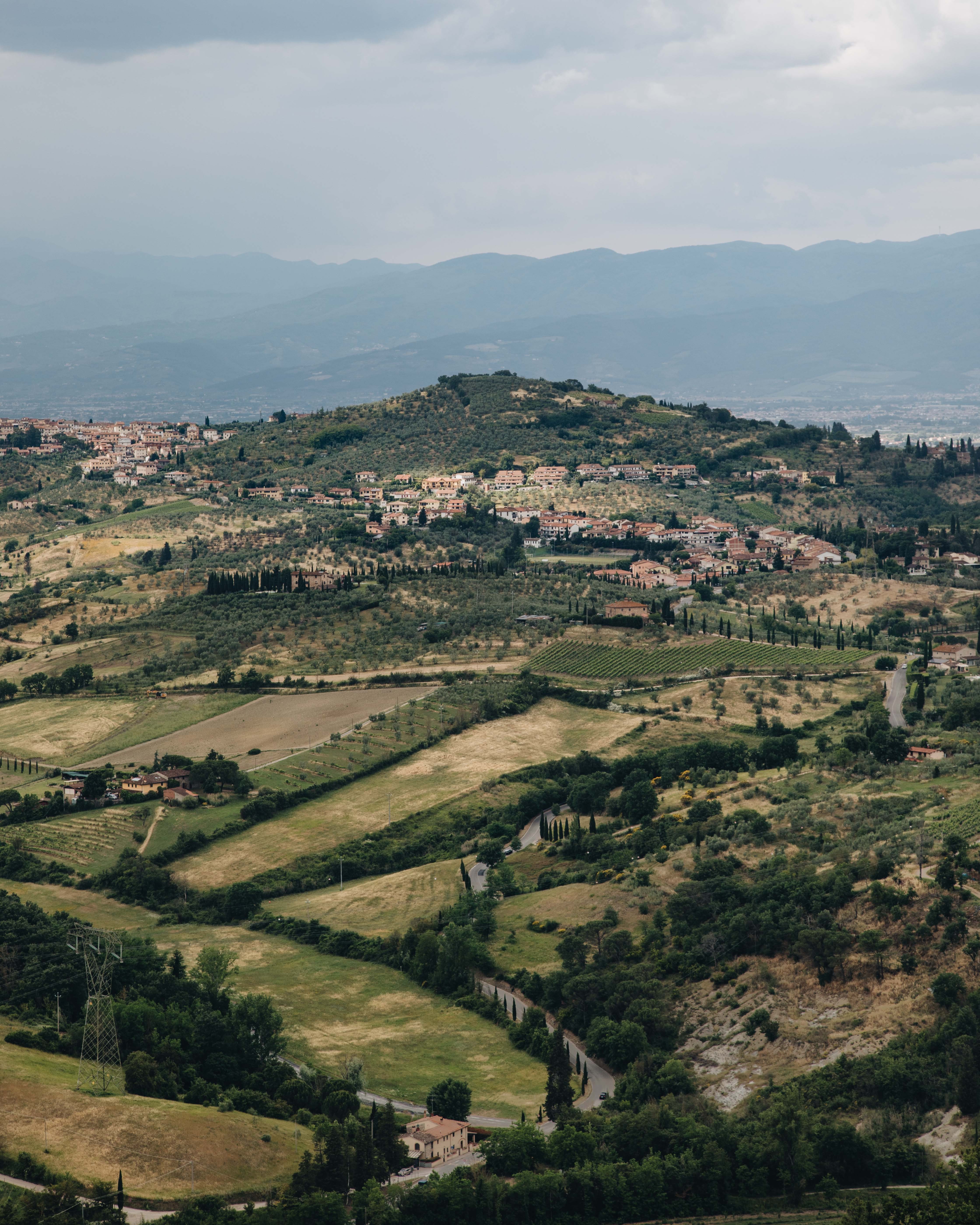 Stunning Italian Hillside Town Captured Amid Expansive Landscape