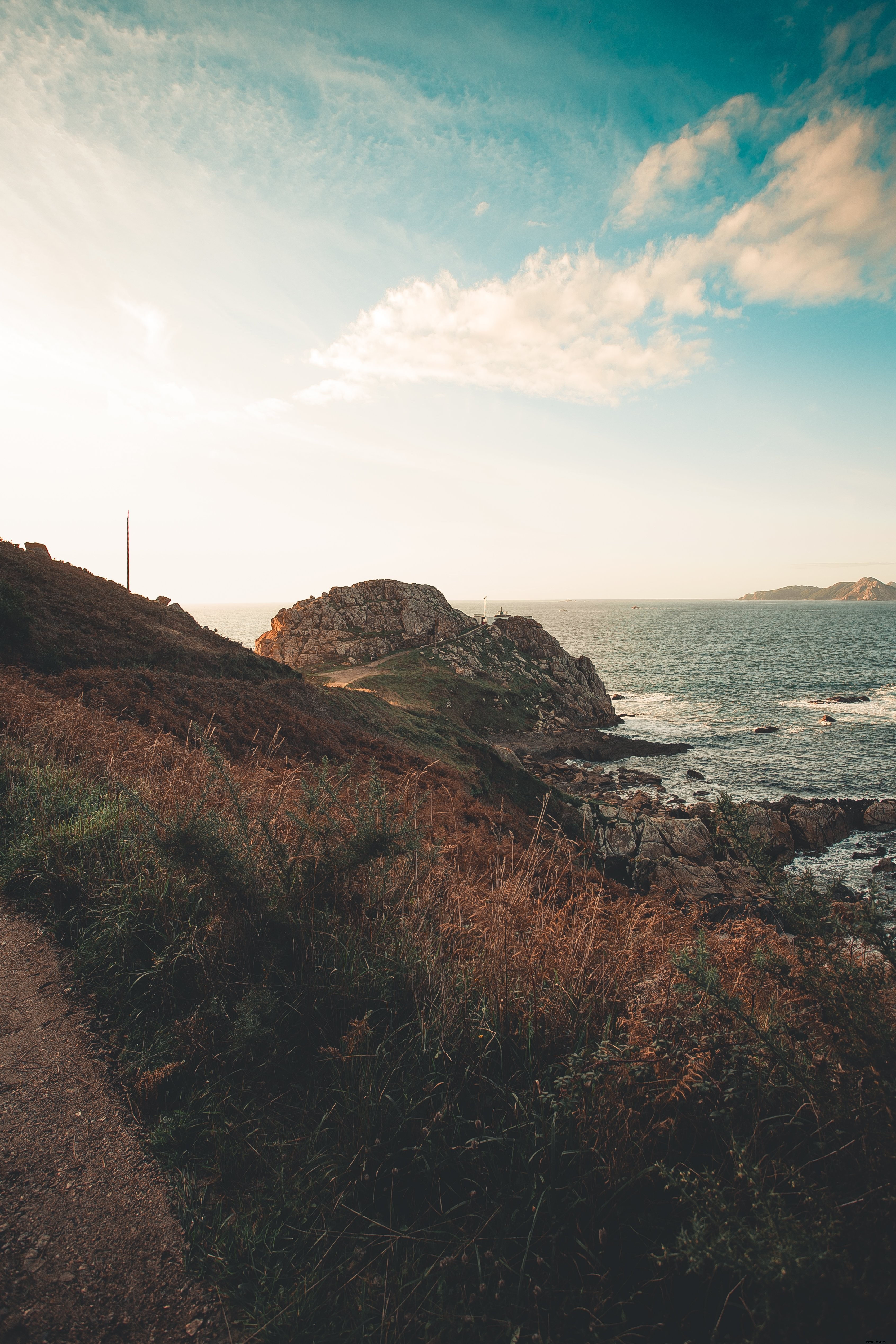 Sunlit Rocky Shore Photo: Capturing Nature s Radiant Beauty