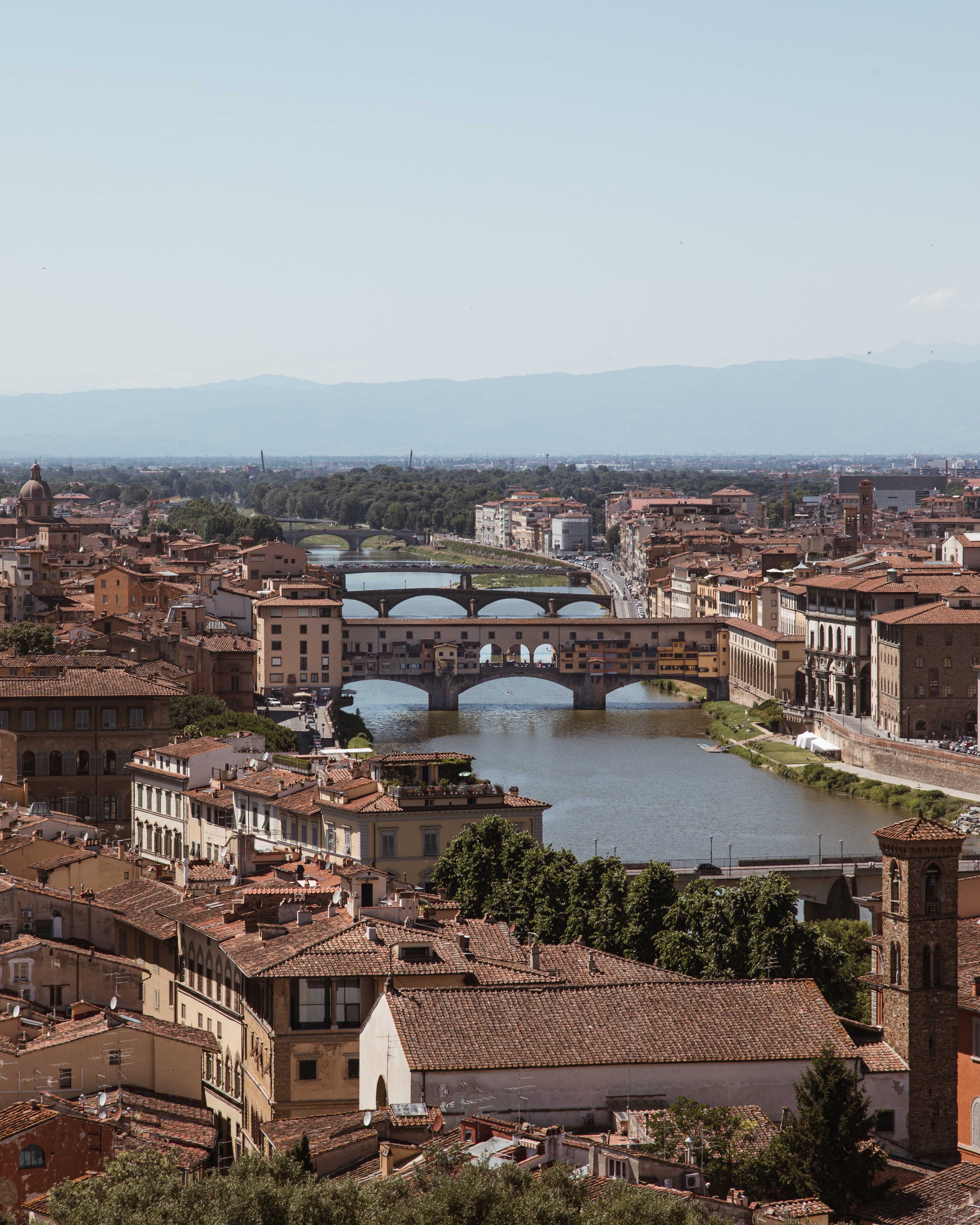 Stunning Cityscape: River Flowing Through Urban Landscape