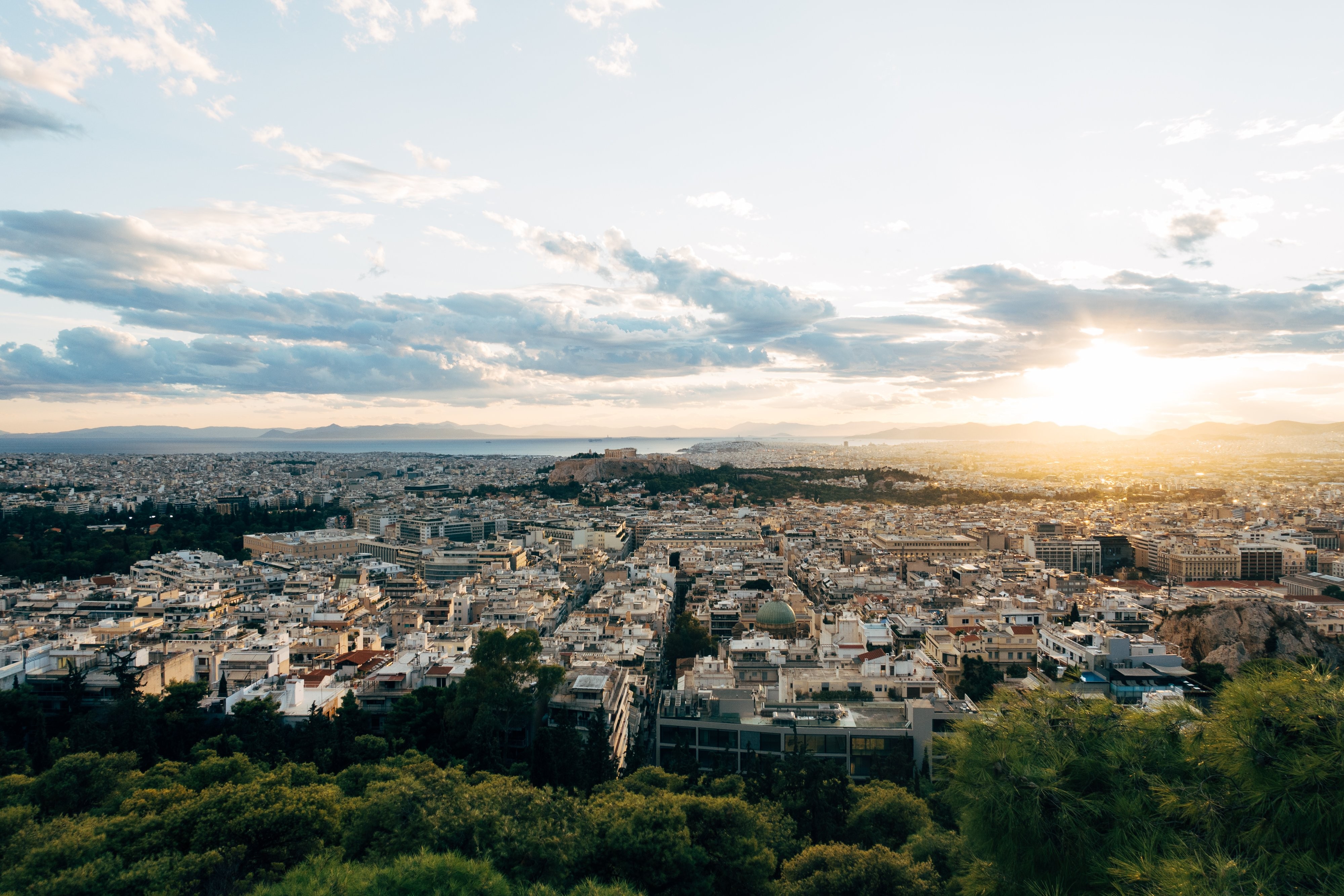 Aerial Sunset Over a Vibrant Urban Landscape