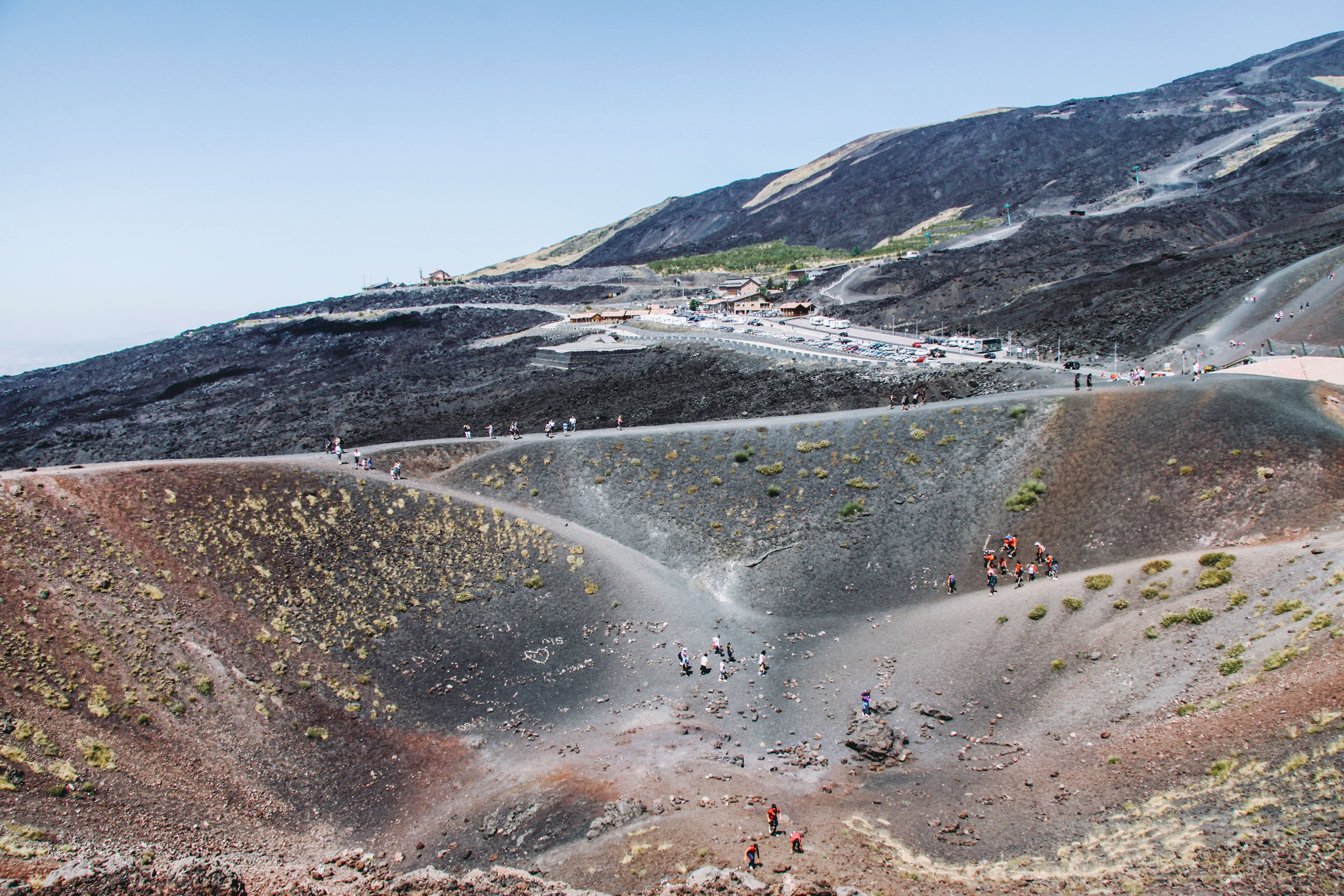 Volcanic Hills Exploration by Hikers – Stunning Photo