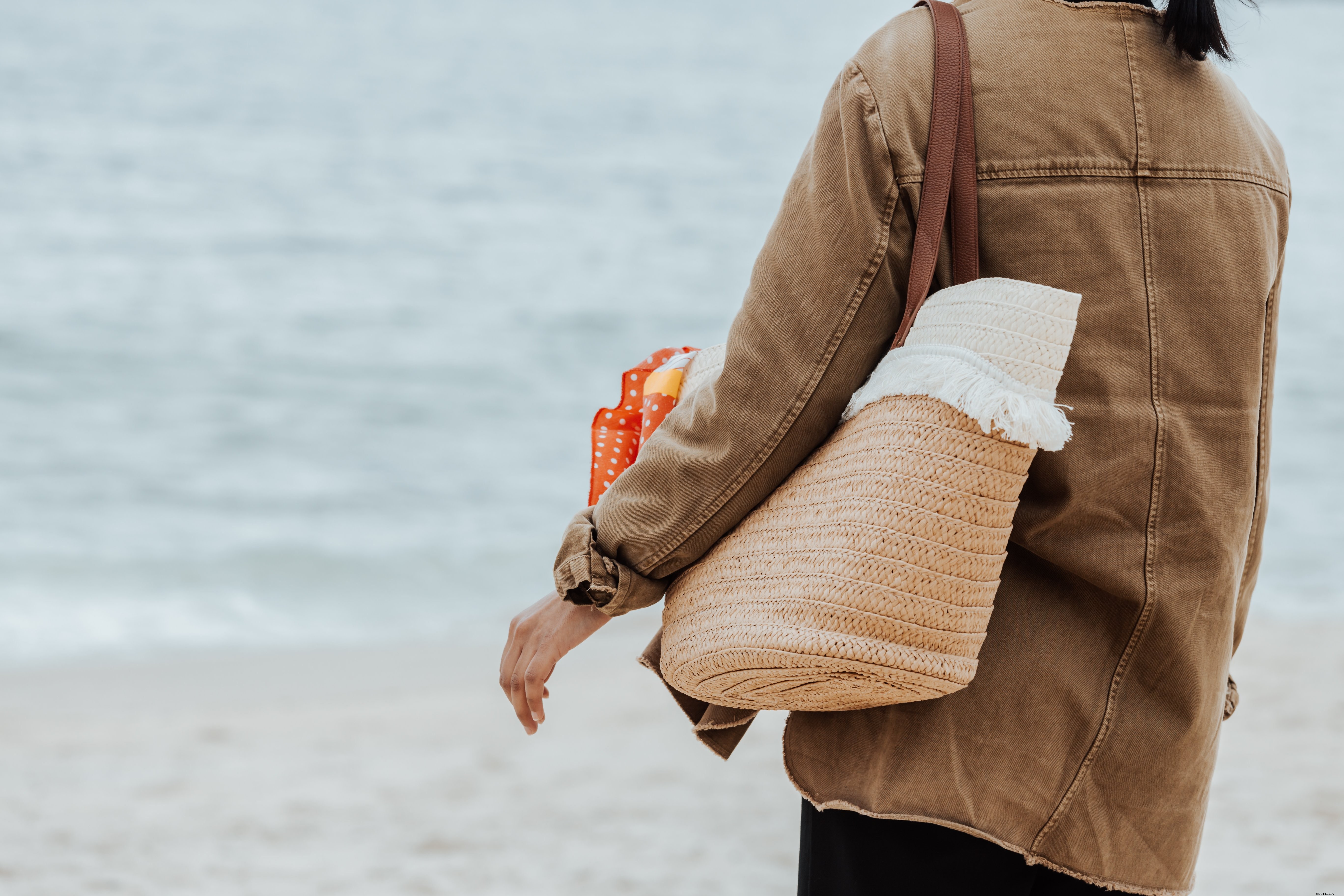 Portrait of a Person s Torso Facing Wavy Blue Water