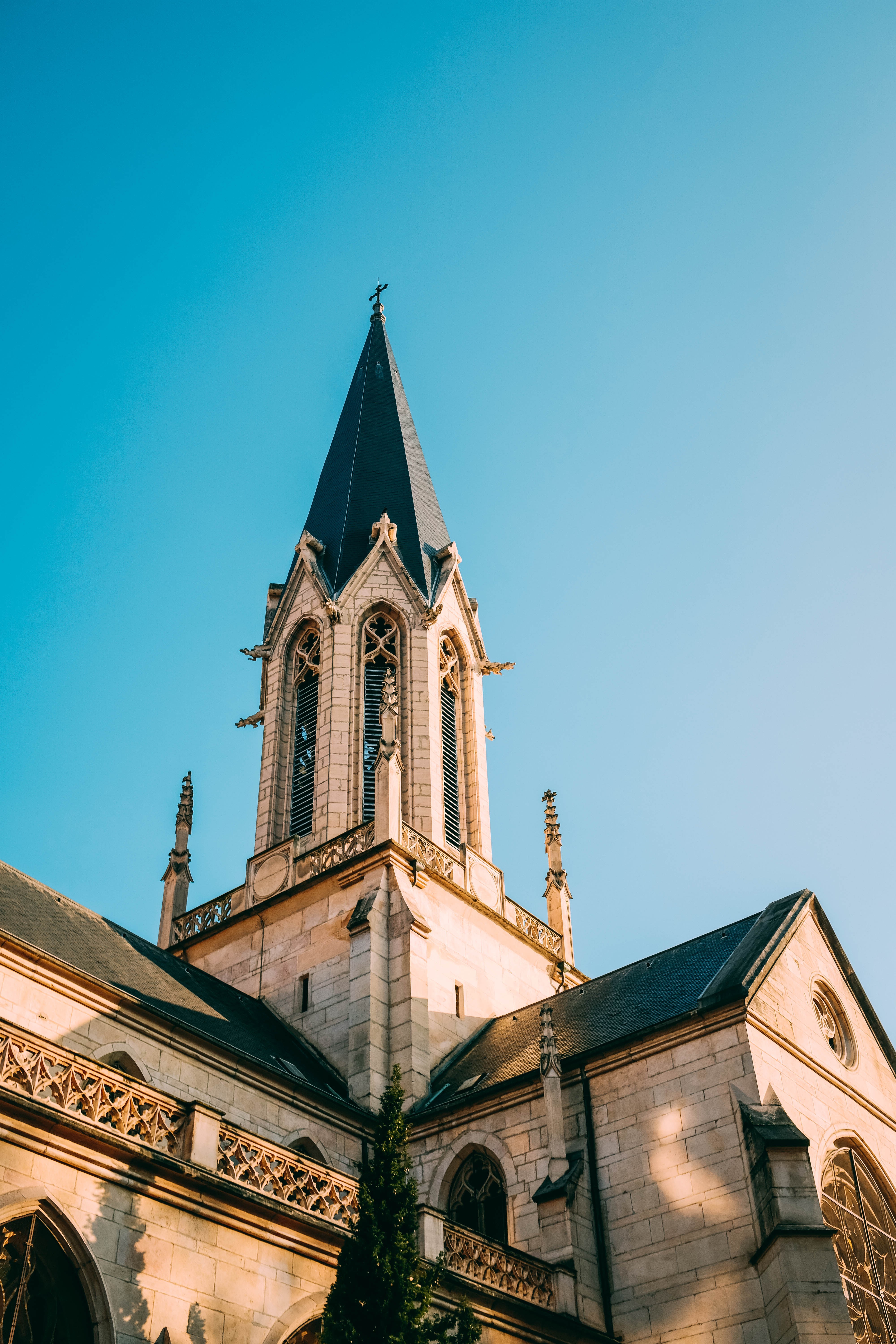Sunlit Church Steeple: A Captivating Photograph