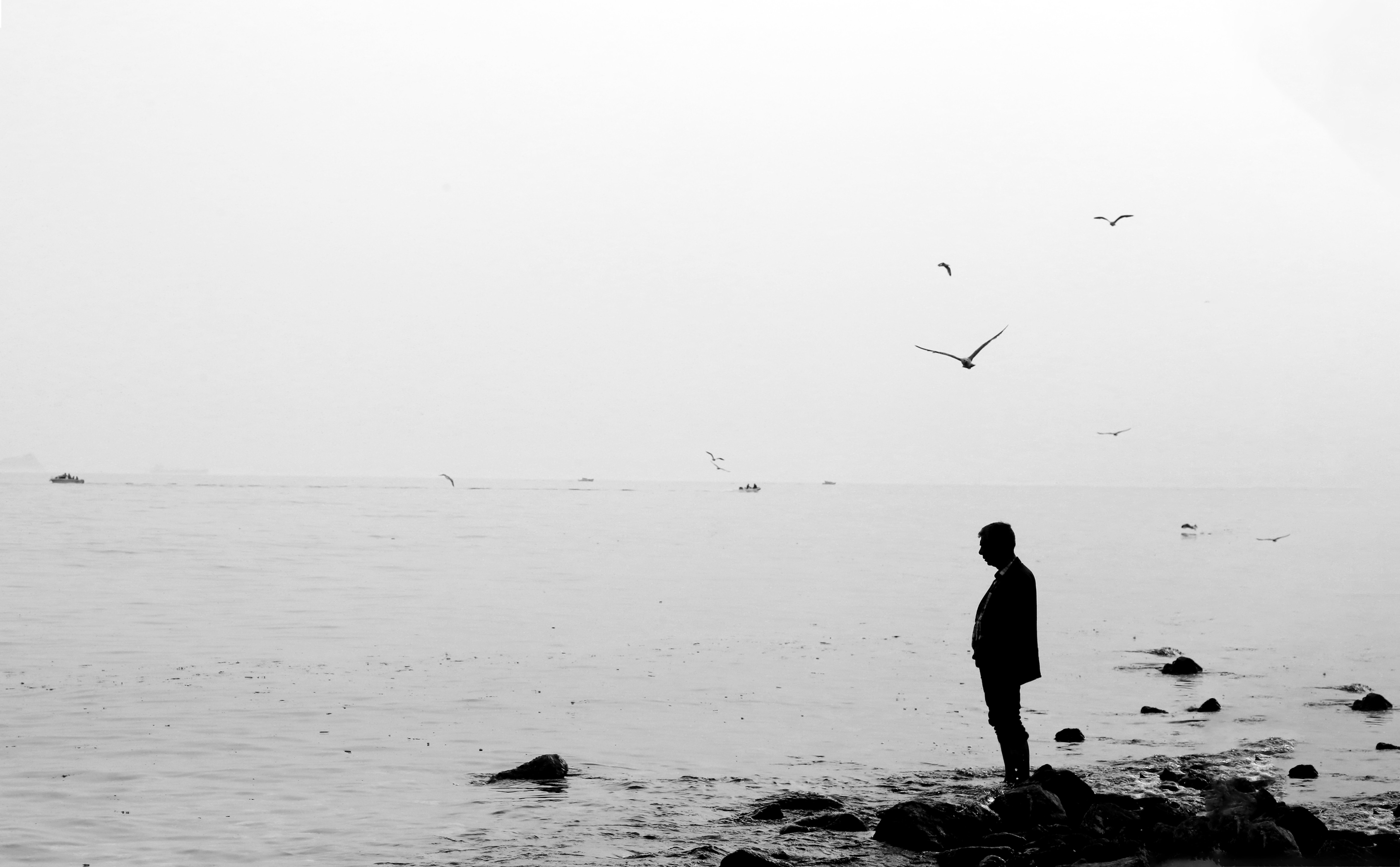 Stunning Black‑and‑White Portrait: Person Reflecting on Calm Water